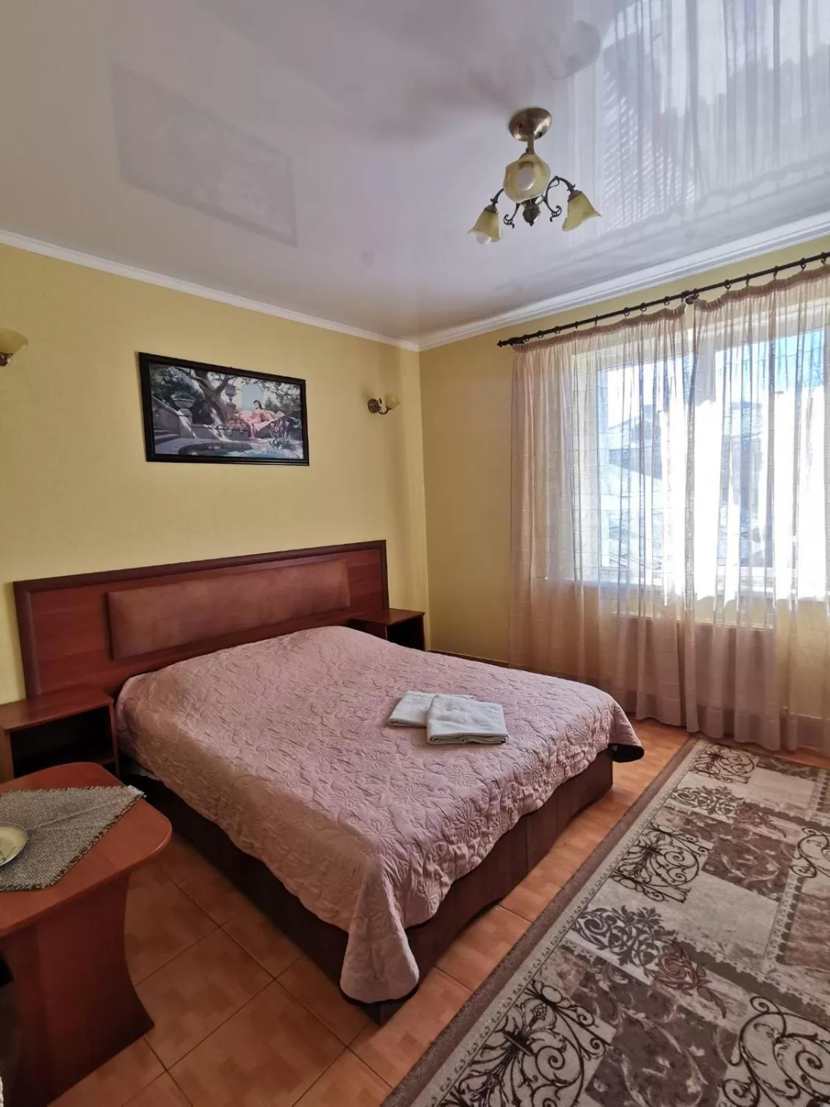 Bed in Monte-Kristo Hotel