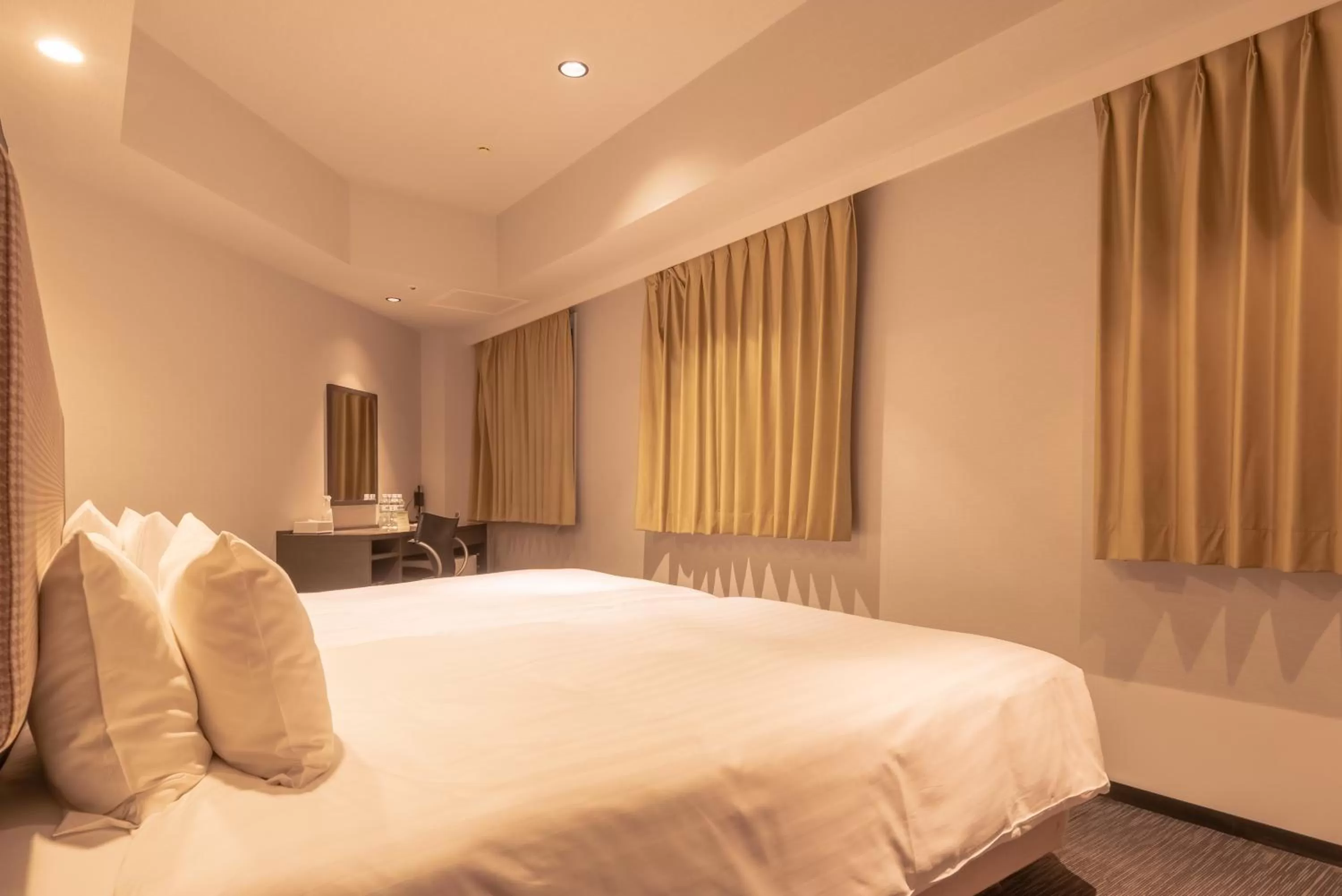 Bed in E Hotel Higashi Shinjuku