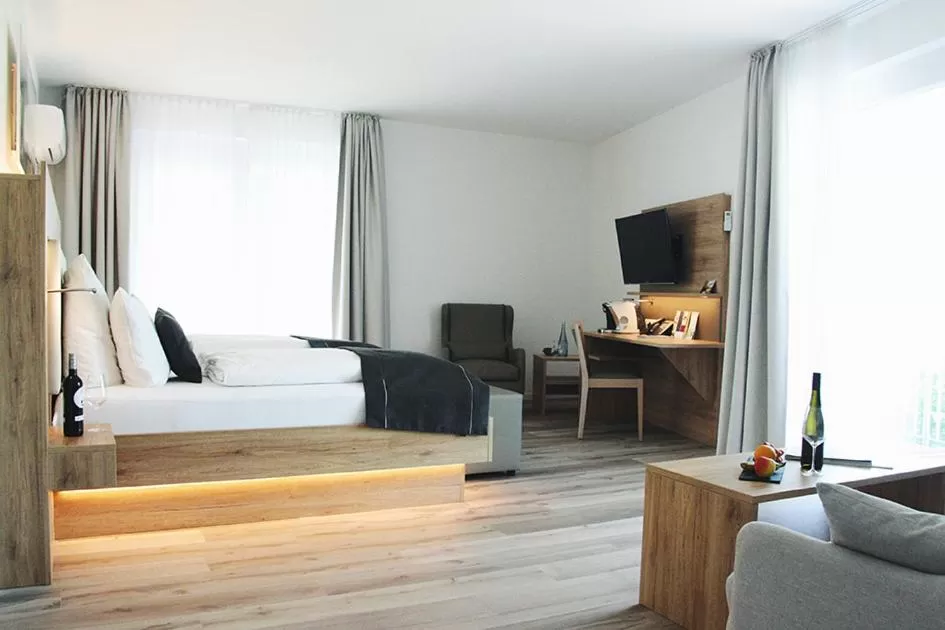 Photo of the whole room, Bed in Four Stars by City Hotel