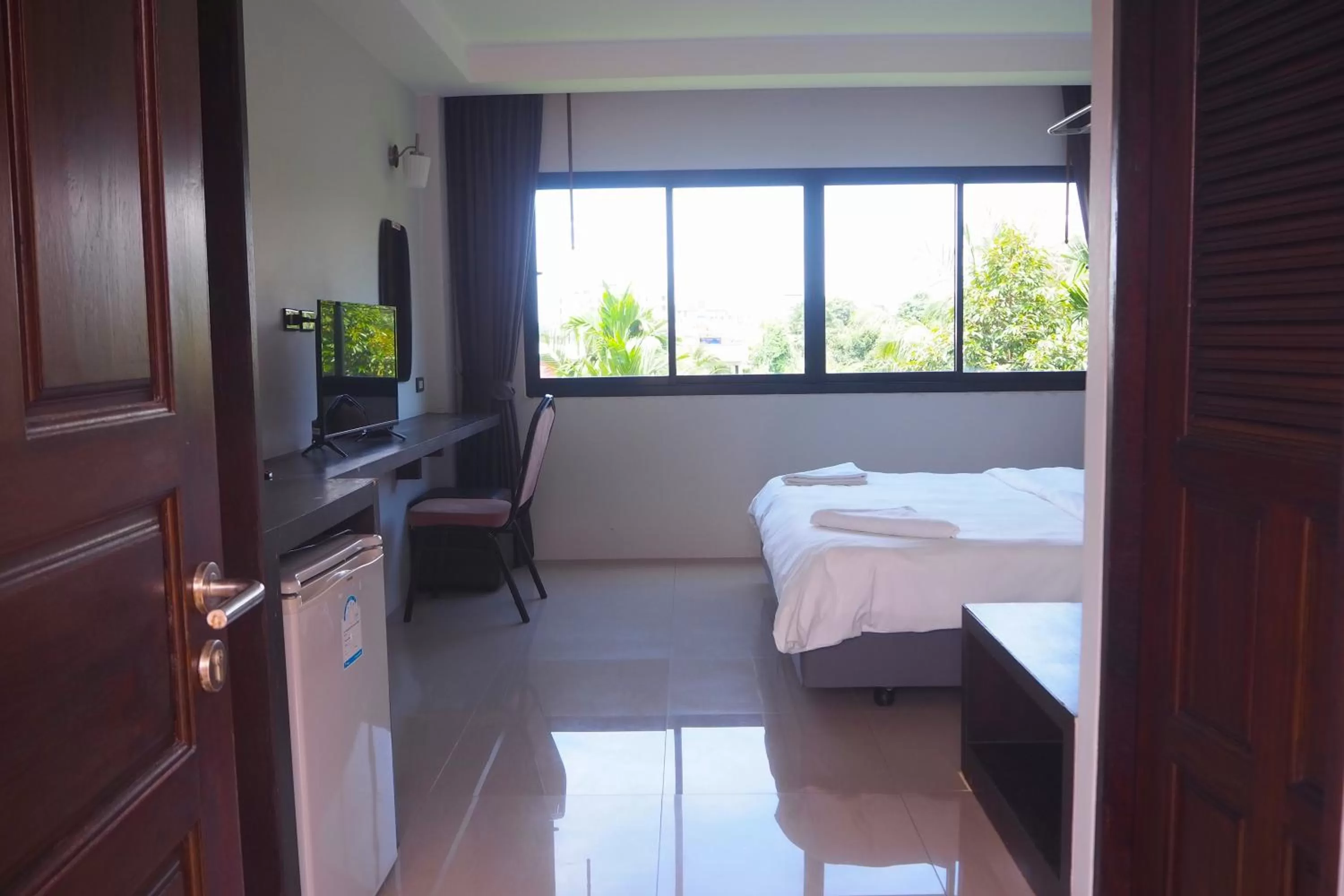 Photo of the whole room, Bed in Rakkawan Residence