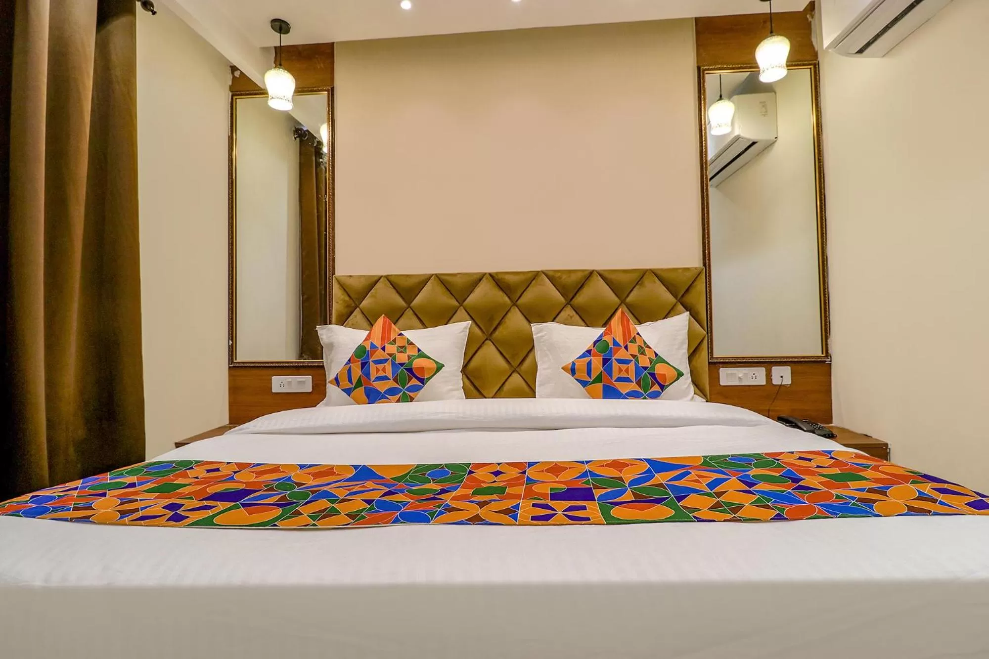 Bed in FabHotel Pitampura