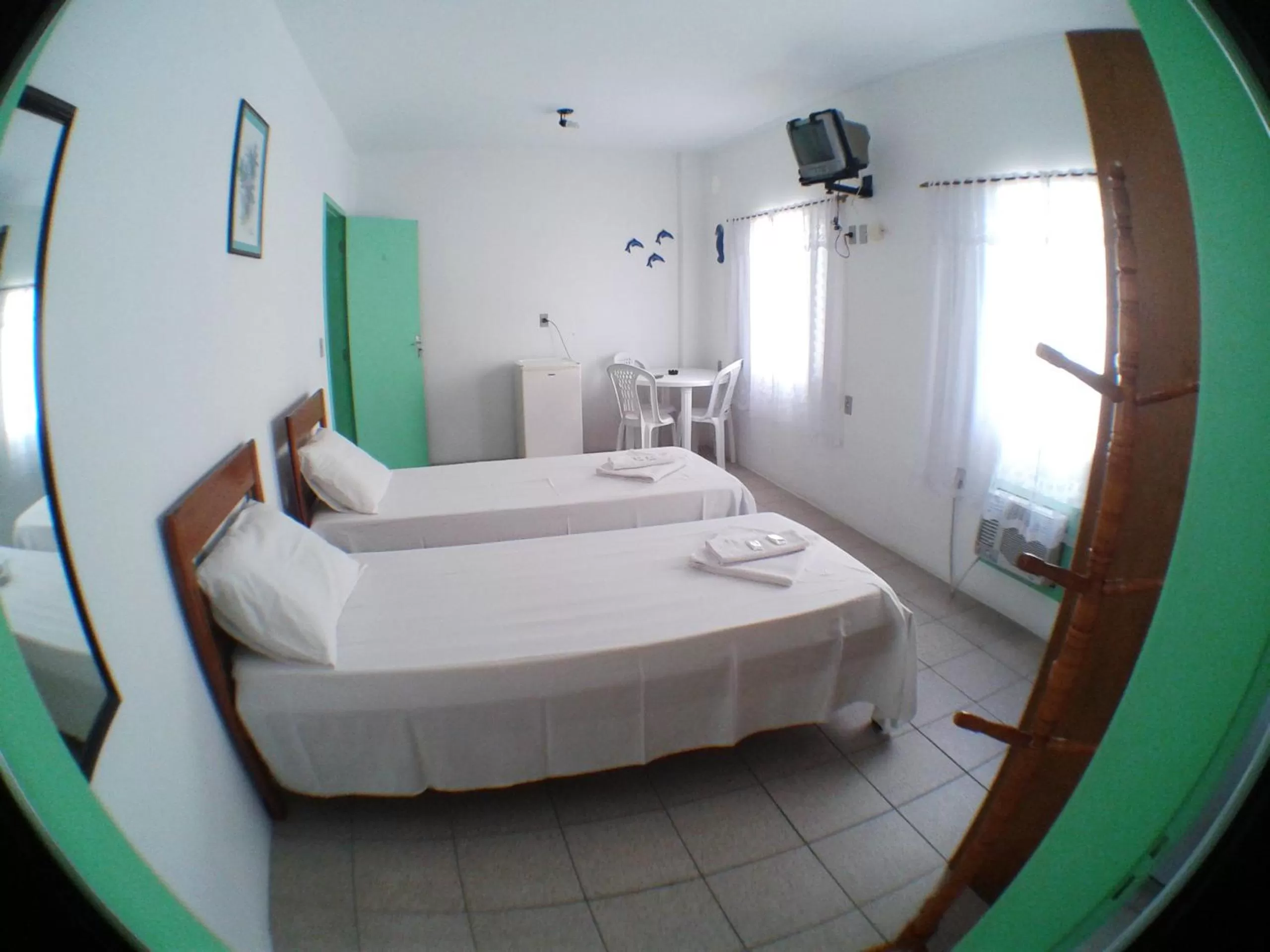 Bed in Pousada Milani