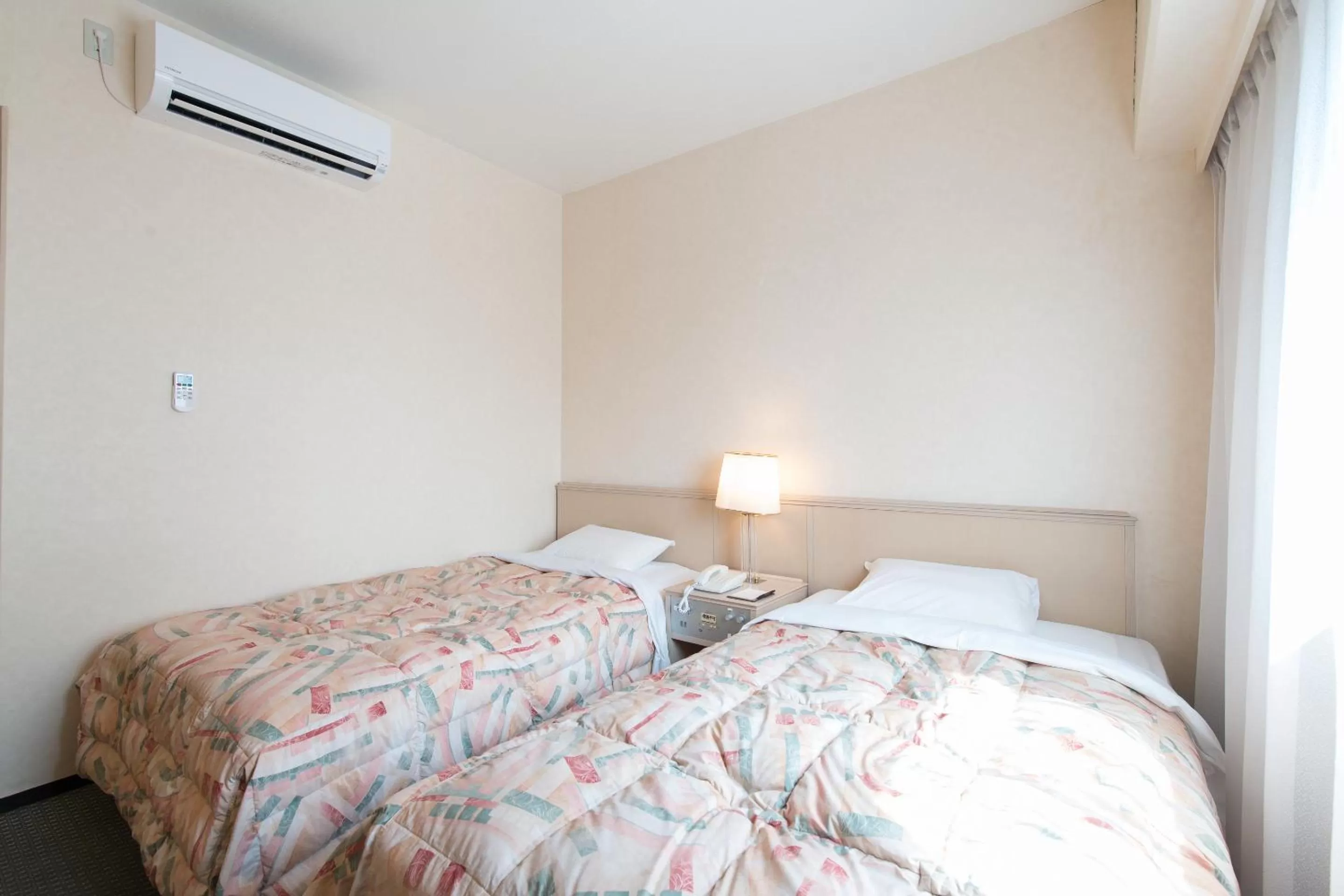 Photo of the whole room, Bed in Tabist Hotel Tetora Kitakyushu