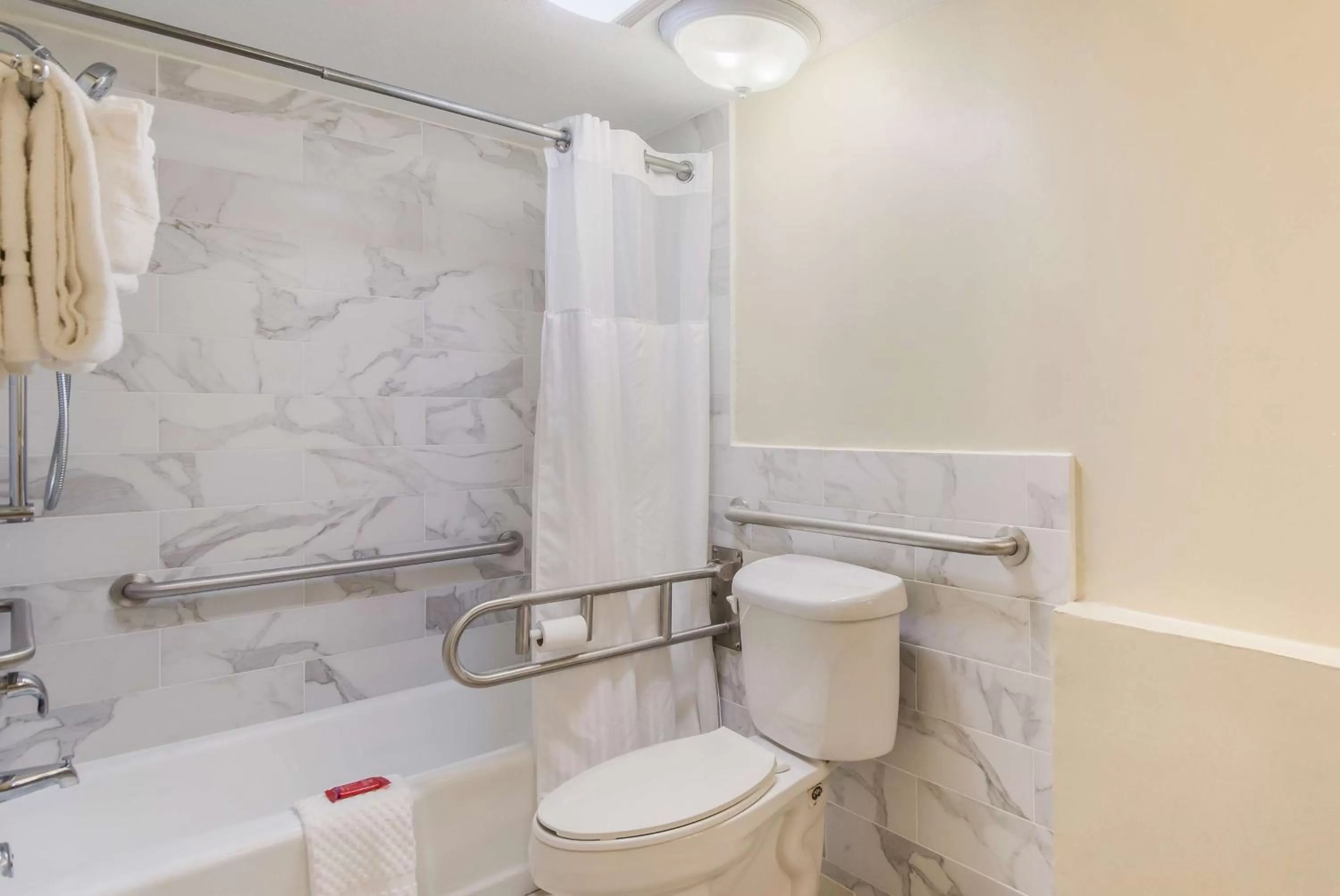 Bathroom in SureStay Hotel by Best Western Sarasota Lido Beach