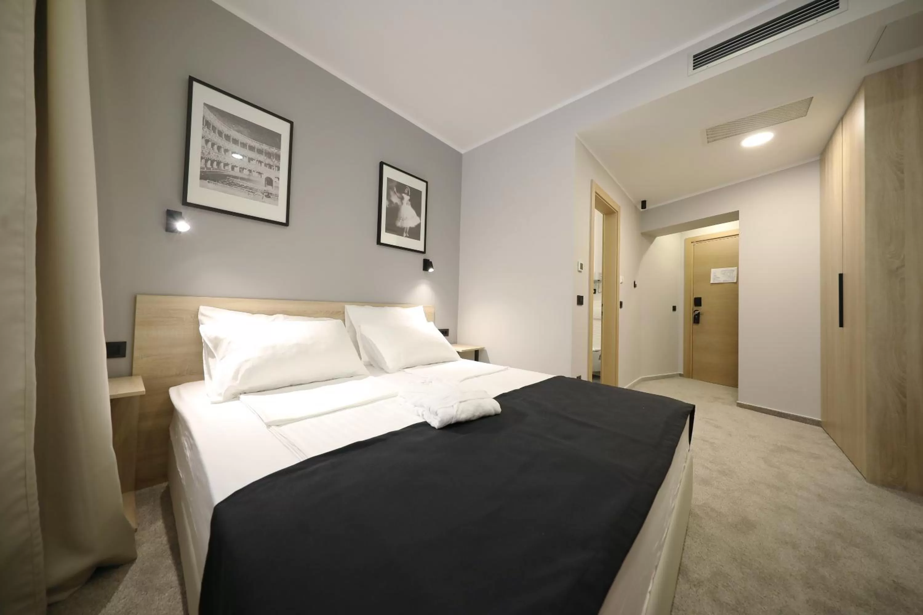 Bed in Teatro Verdi Boutique Hotel