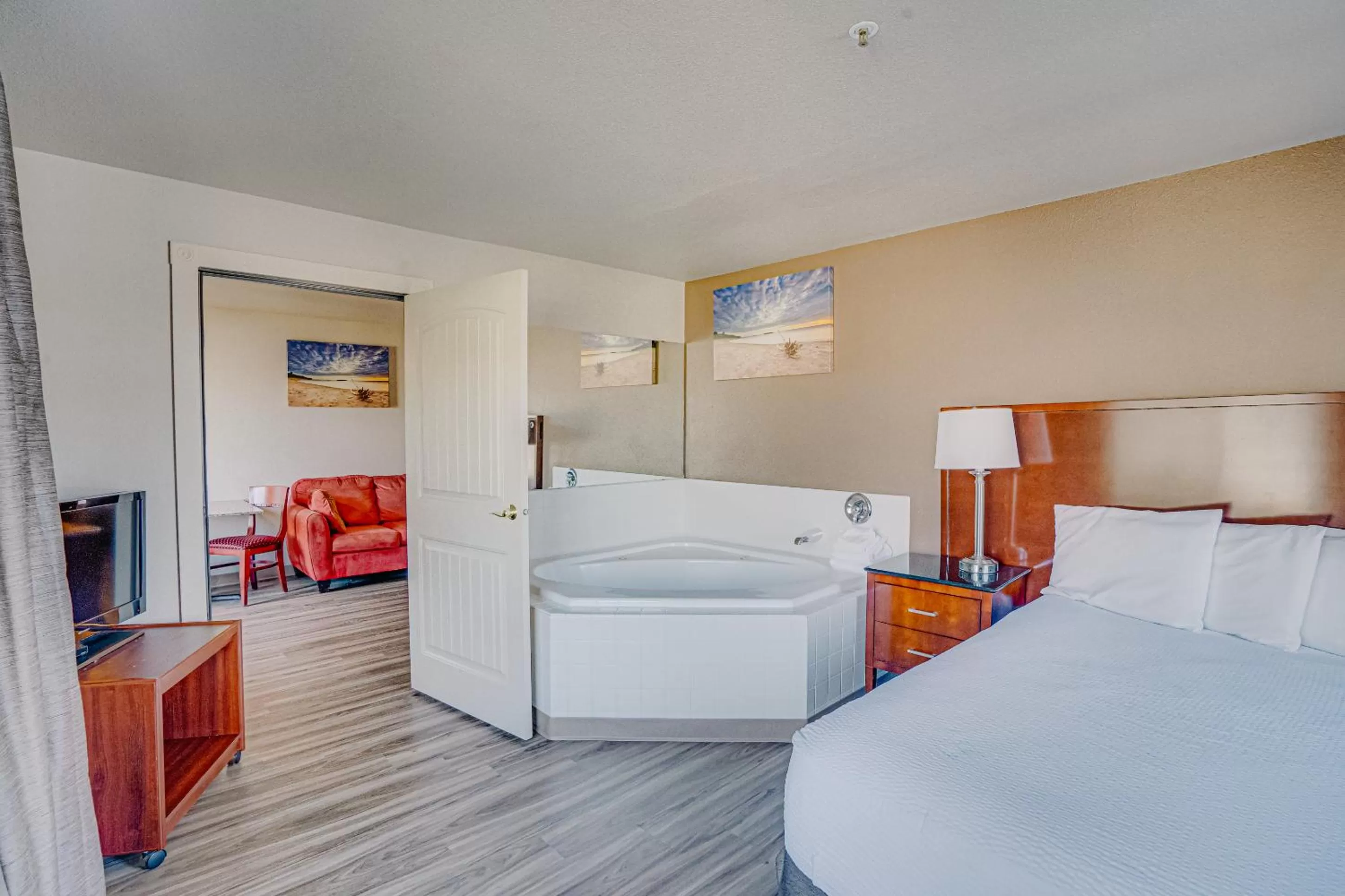 Bed in The Ashley Inn & Suites