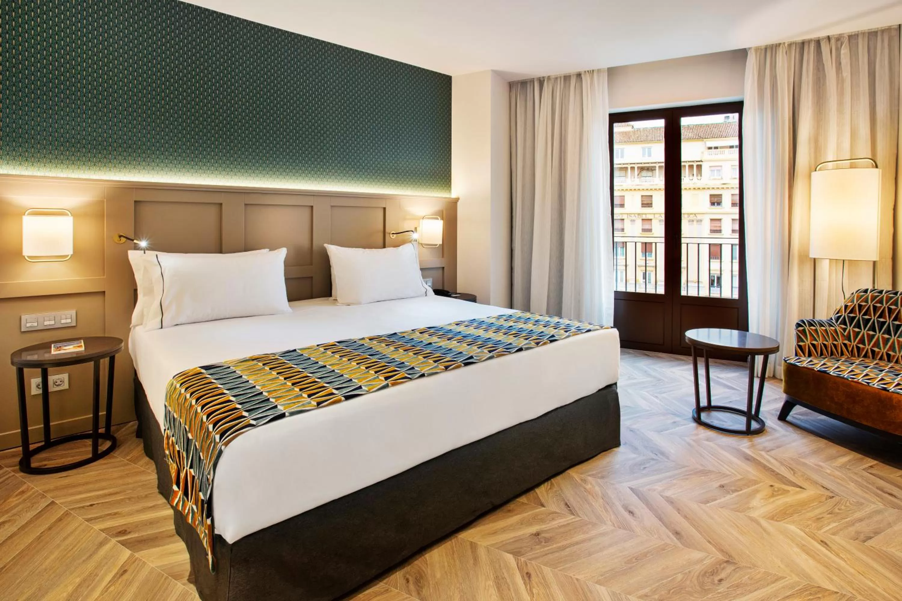 Photo of the whole room, Bed in Eurostars Puerta Real