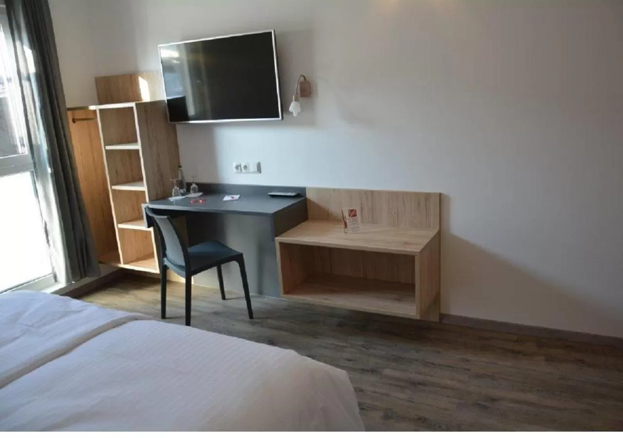 Photo of the whole room, TV/Entertainment Center in Hotel Hohenloher Tor