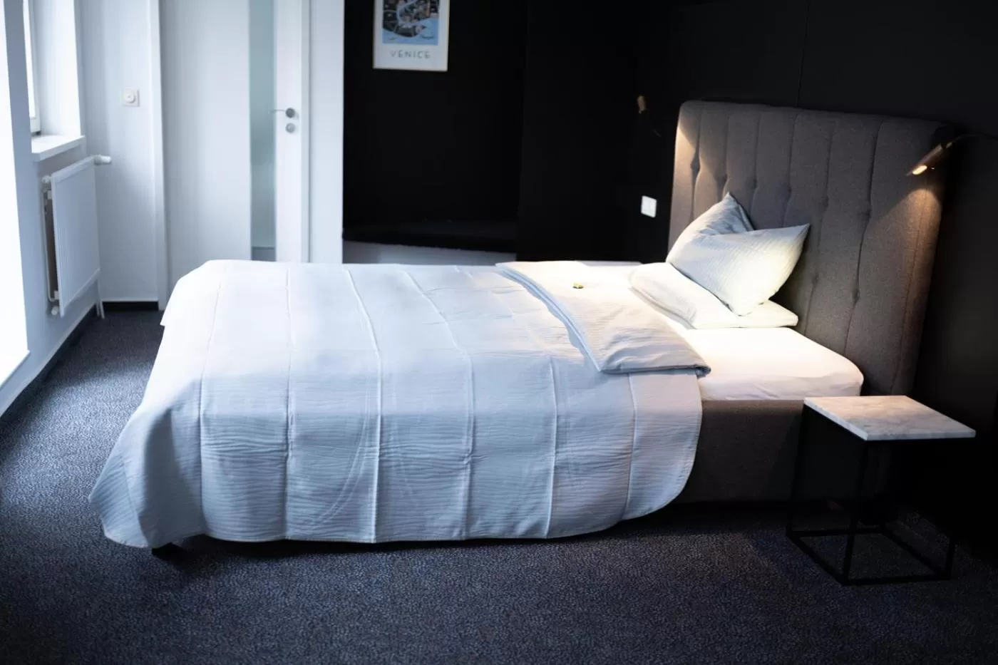 Bed in Magni Boutique Hotel