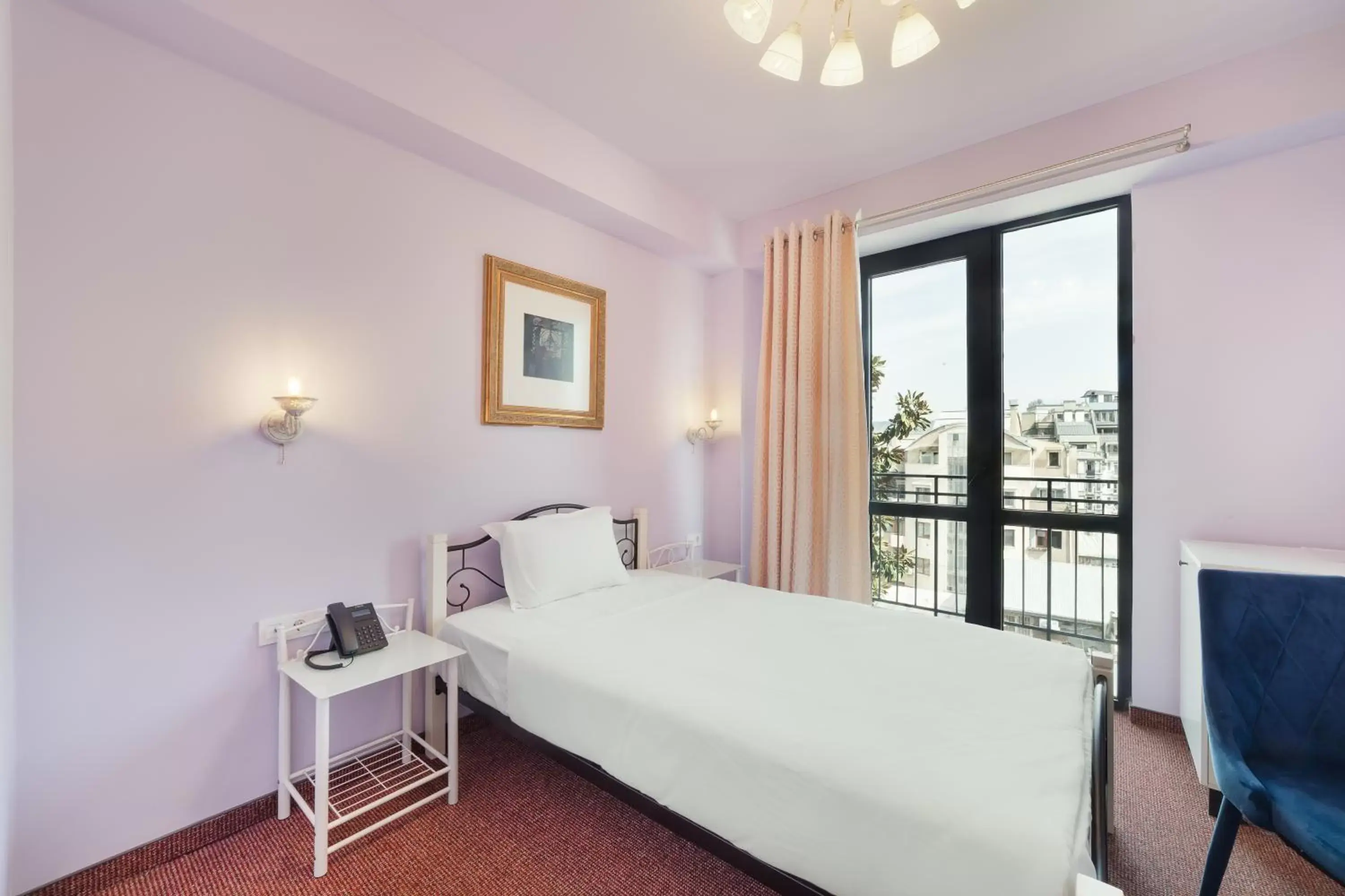 Single Room with Balcony in Magnolia Single Room with Balcony in Magnolia