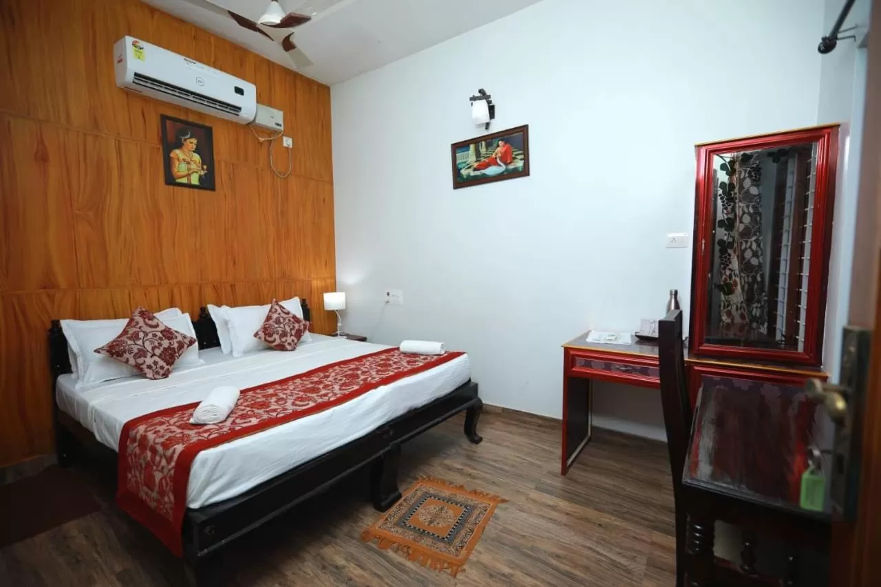 Bed in Ideal Ayurvedic Resort Kovalam
