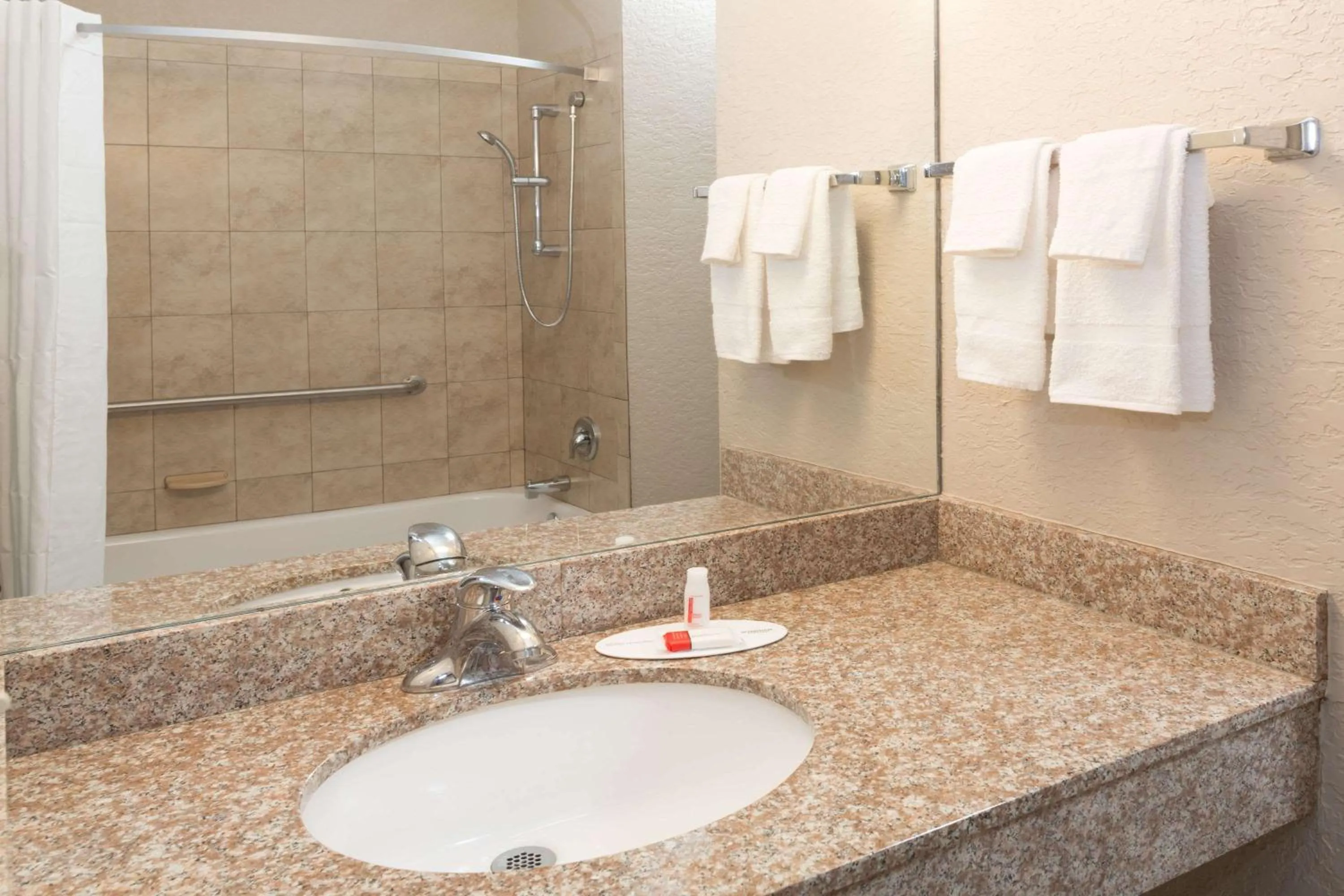 Bathroom in Super 8 by Wyndham Pompano Beach