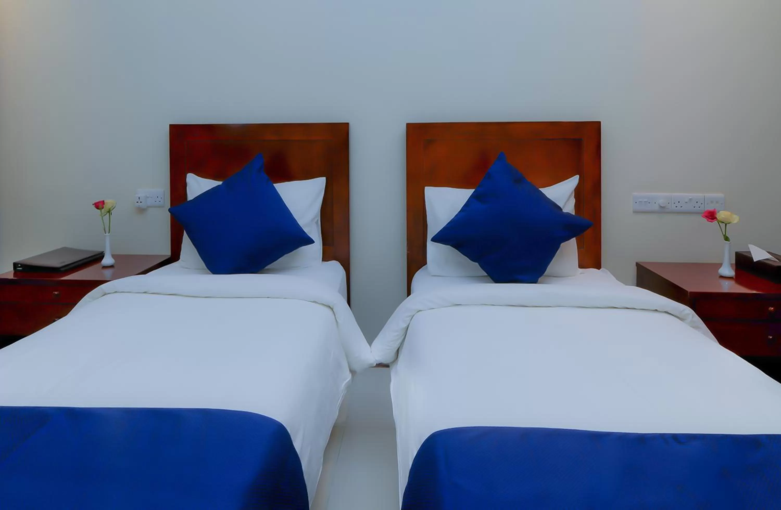 Bedroom, Bed in Tanzanite Executive Suites