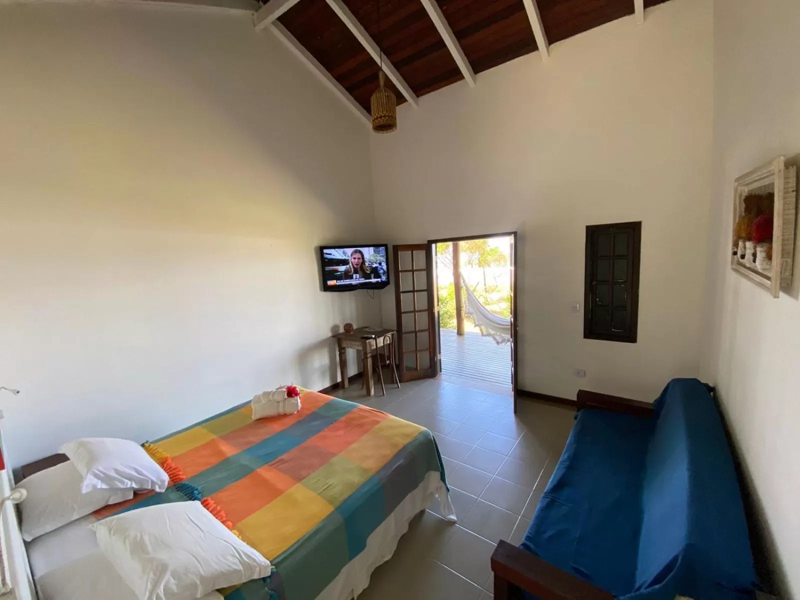 Photo of the whole room, TV/Entertainment Center in Pousada Bahia Boa
