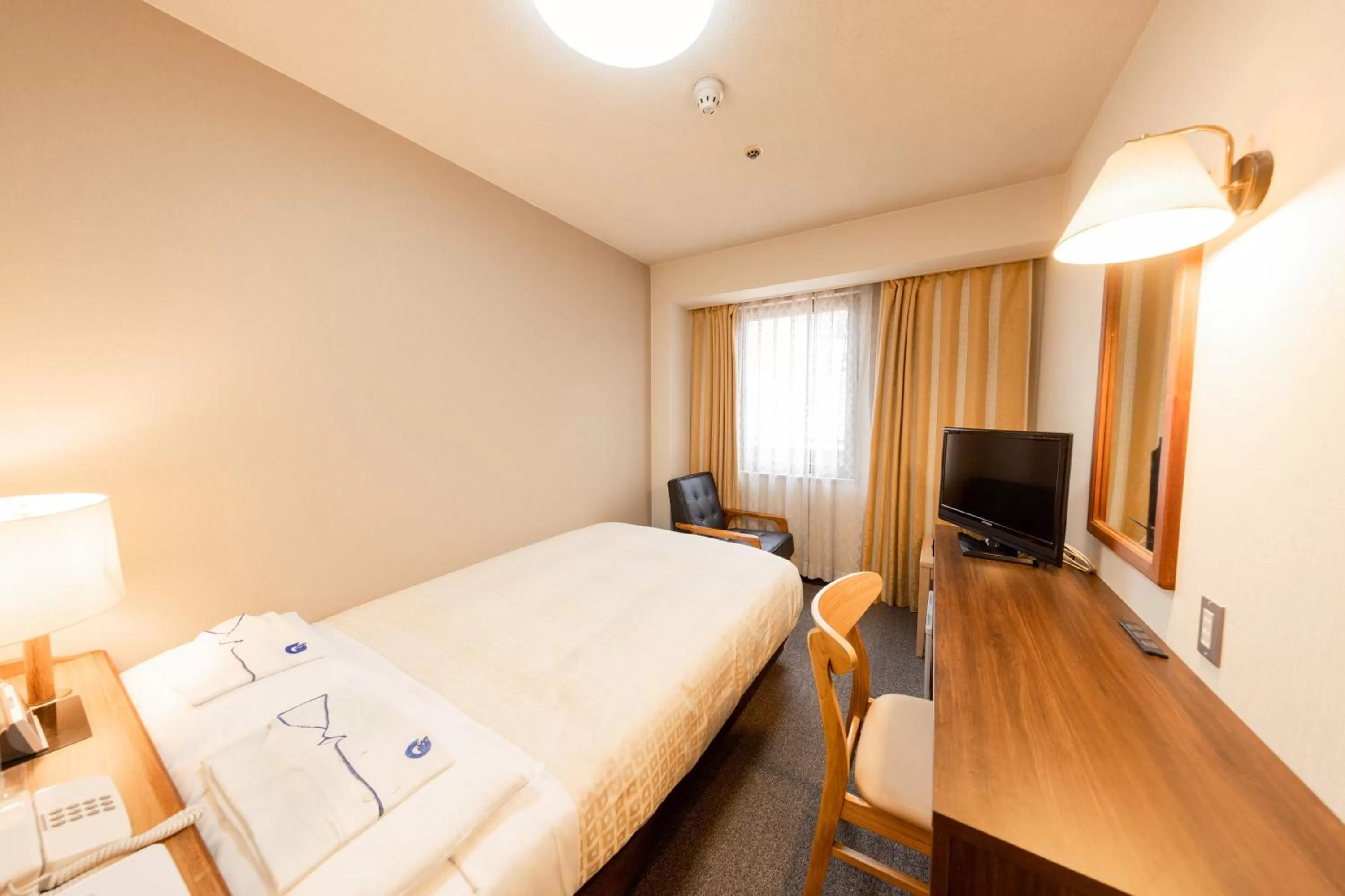 Bed in Nagaoka Grand Hotel