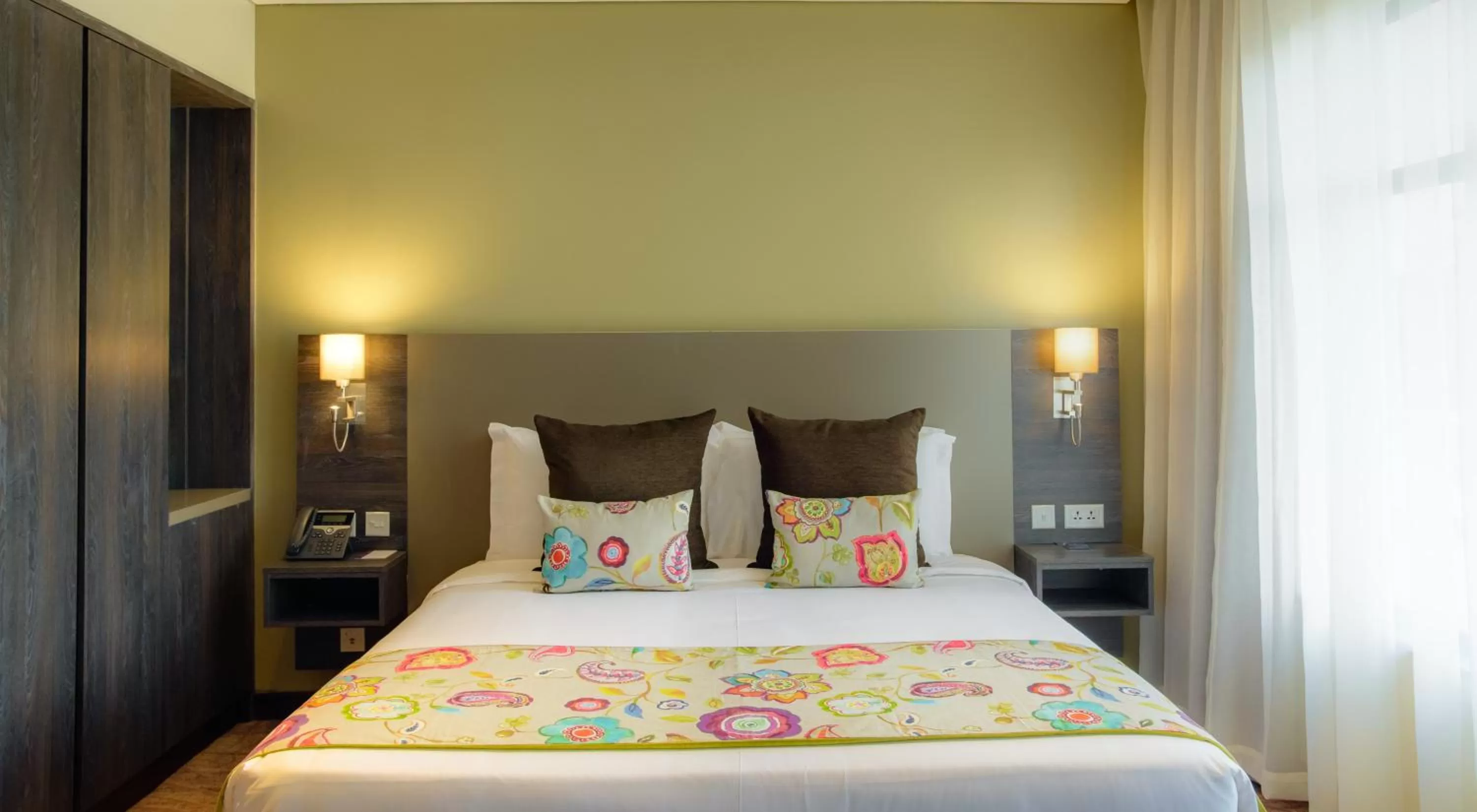 Bed in Tamarind Tree Hotel