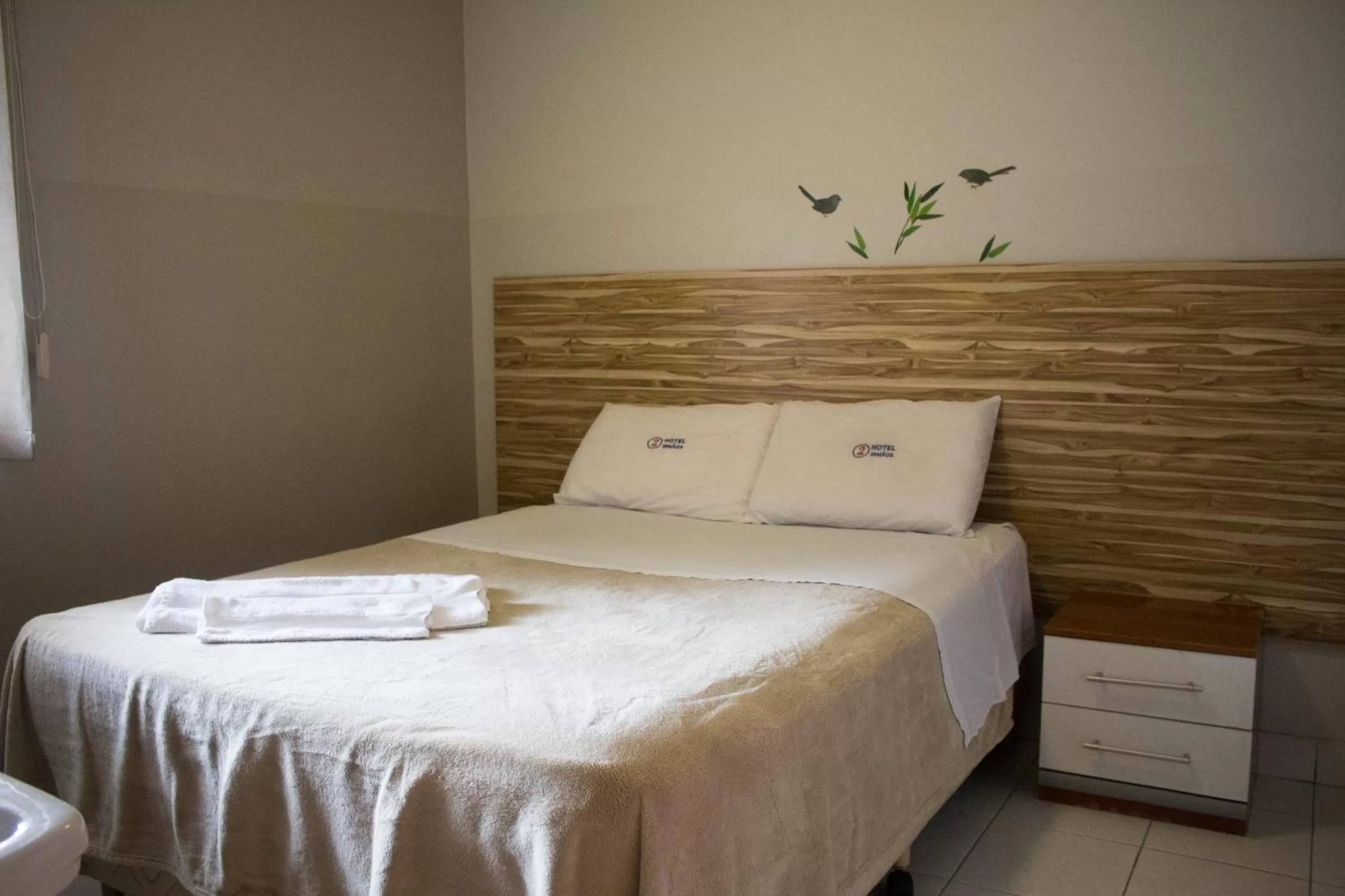 Bed in Hotel Dois Irmãos