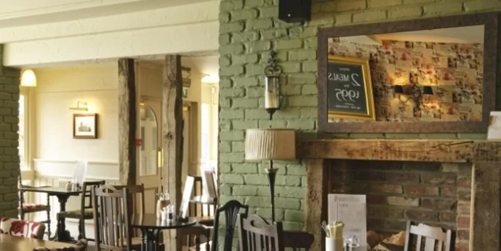 Lounge or bar in Raven Hotel by Greene King Inns