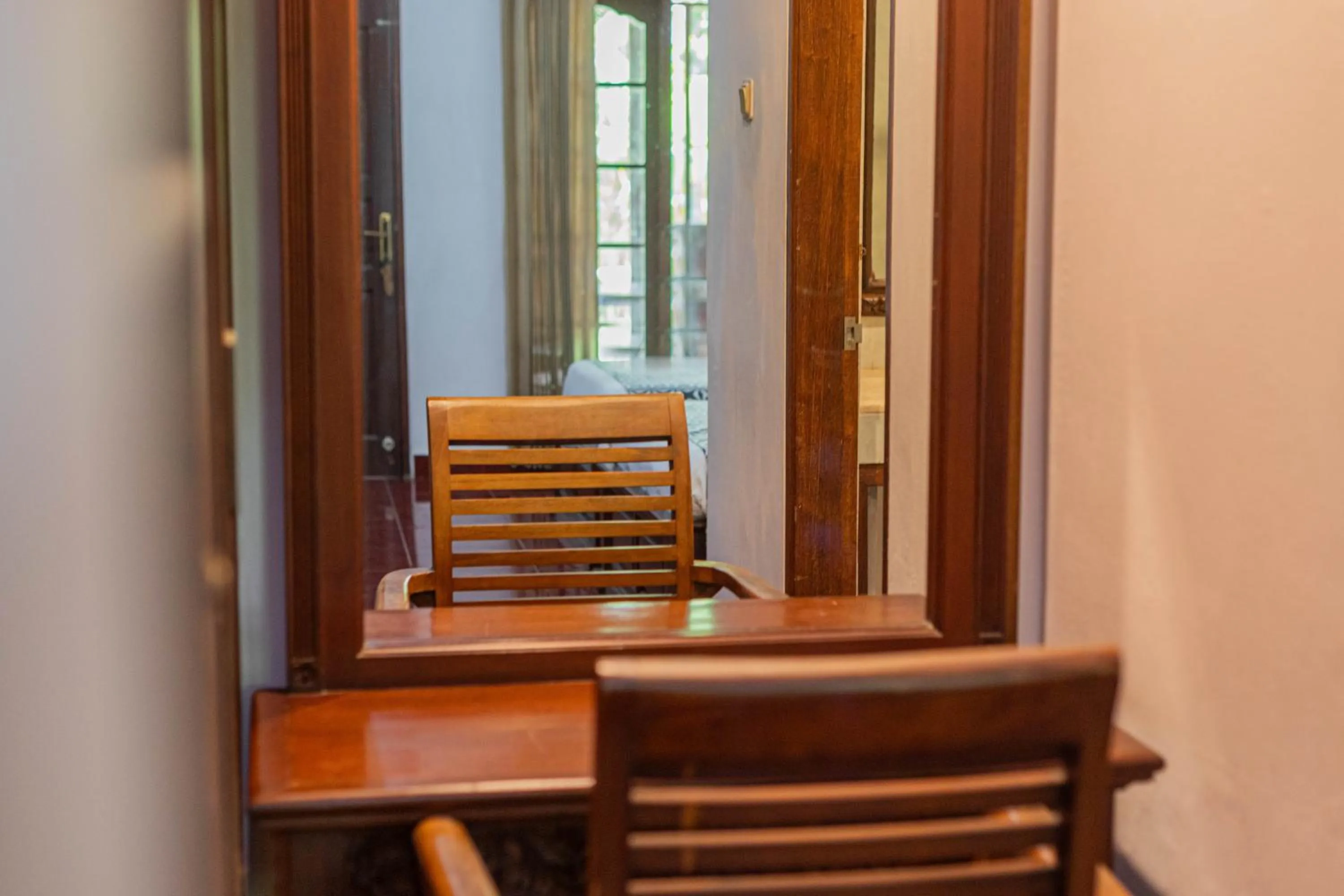 Seating area in Puri Mango Guest House Sanur