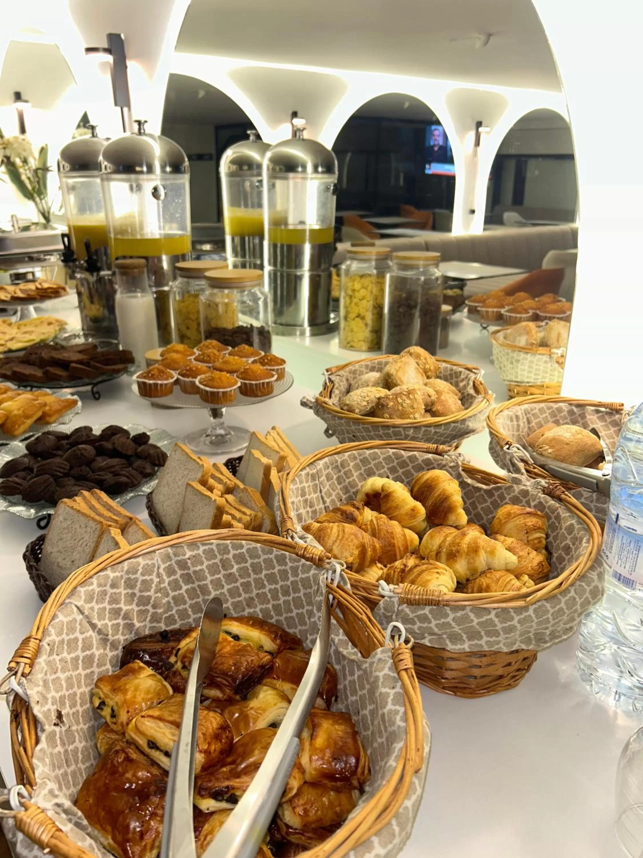 Buffet breakfast in Le M Hôtel