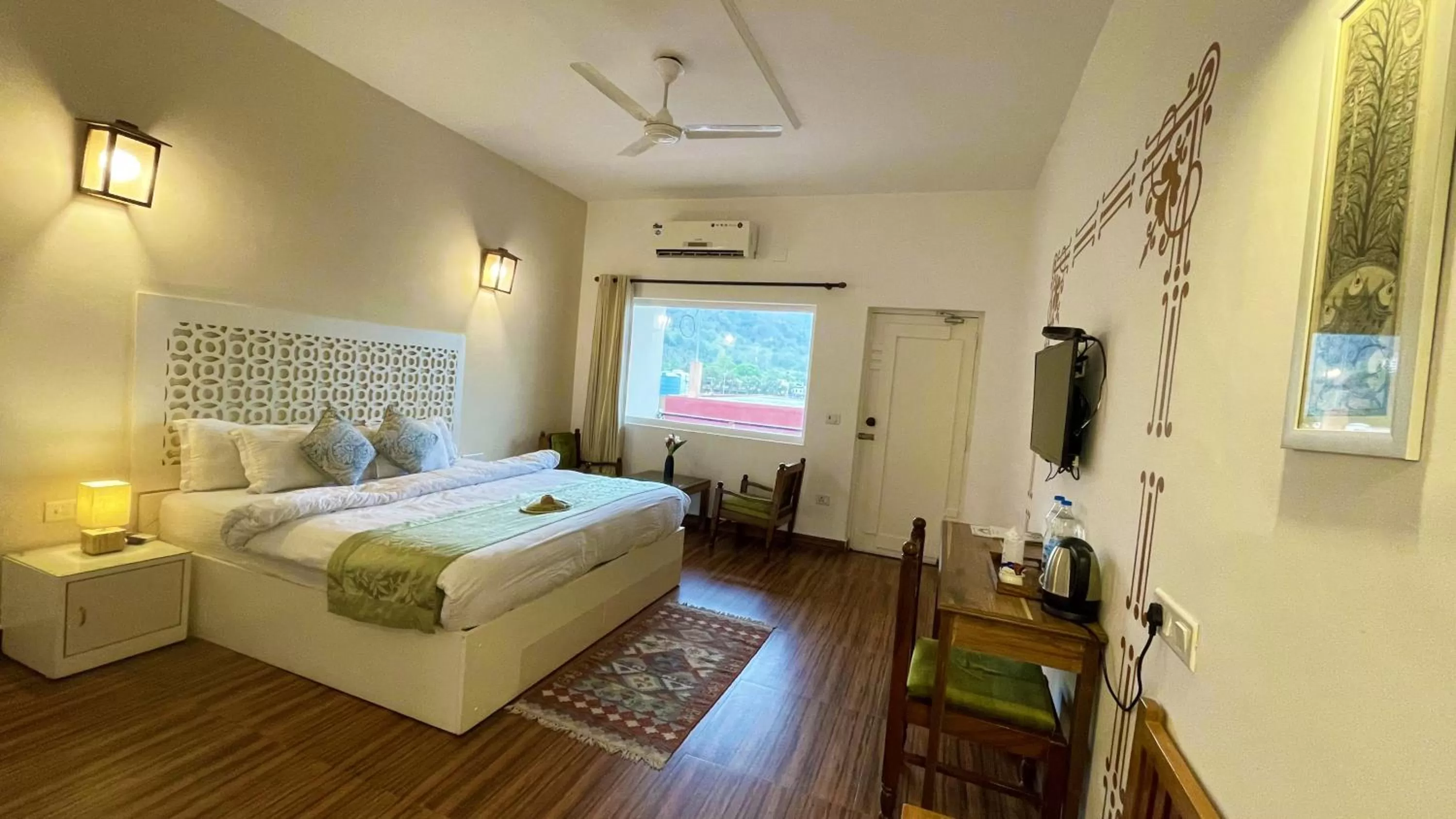 Bed in Sanskriti Vedic Retreat
