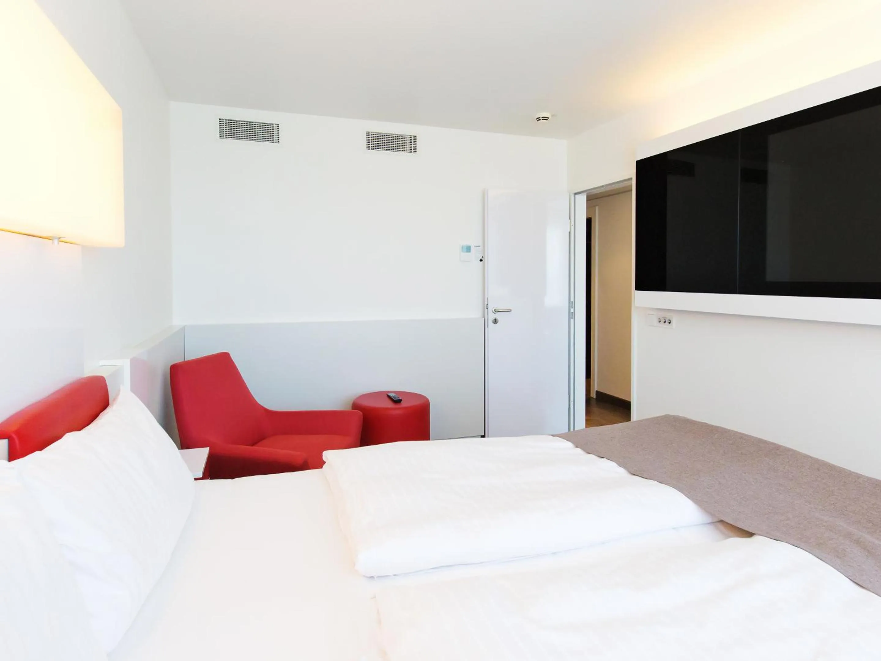 Photo of the whole room, Bed in DORMERO Hotel Stuttgart