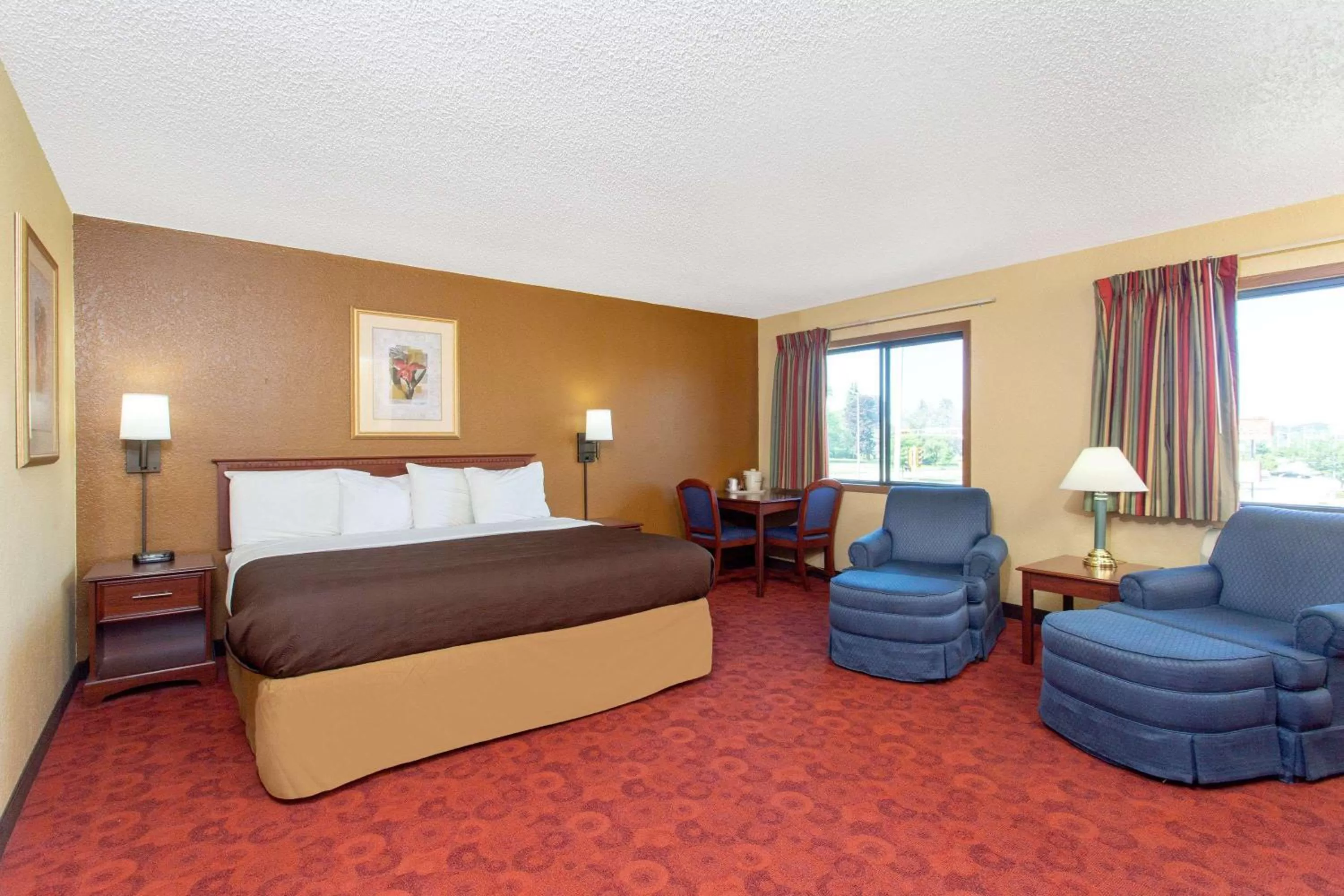 Photo of the whole room, Bed in AmericInn by Wyndham West Bend