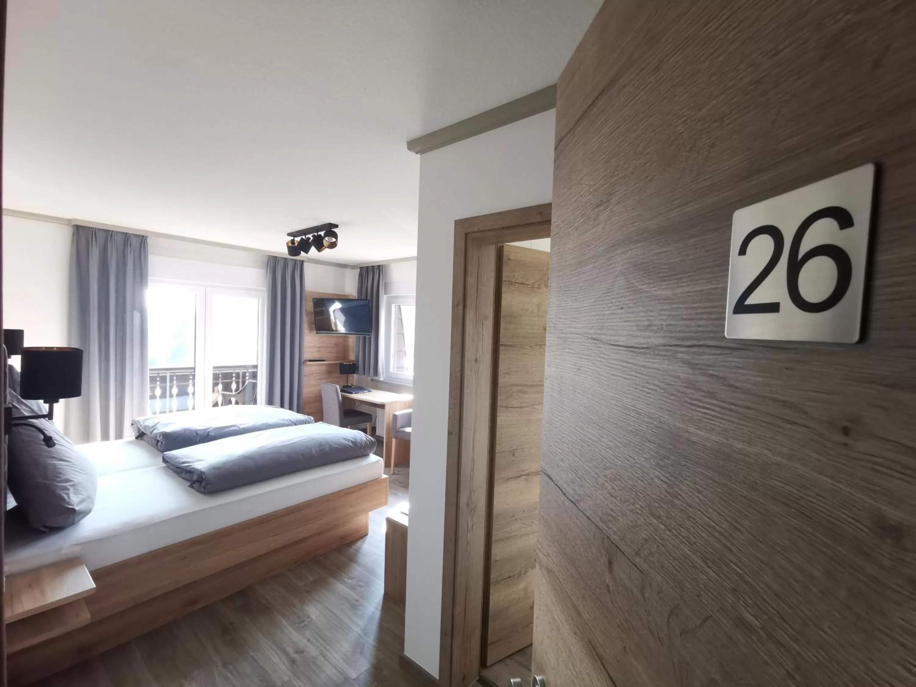 Photo of the whole room, Bed in Hotel Grüner Baum mit Restaurant & Wellness