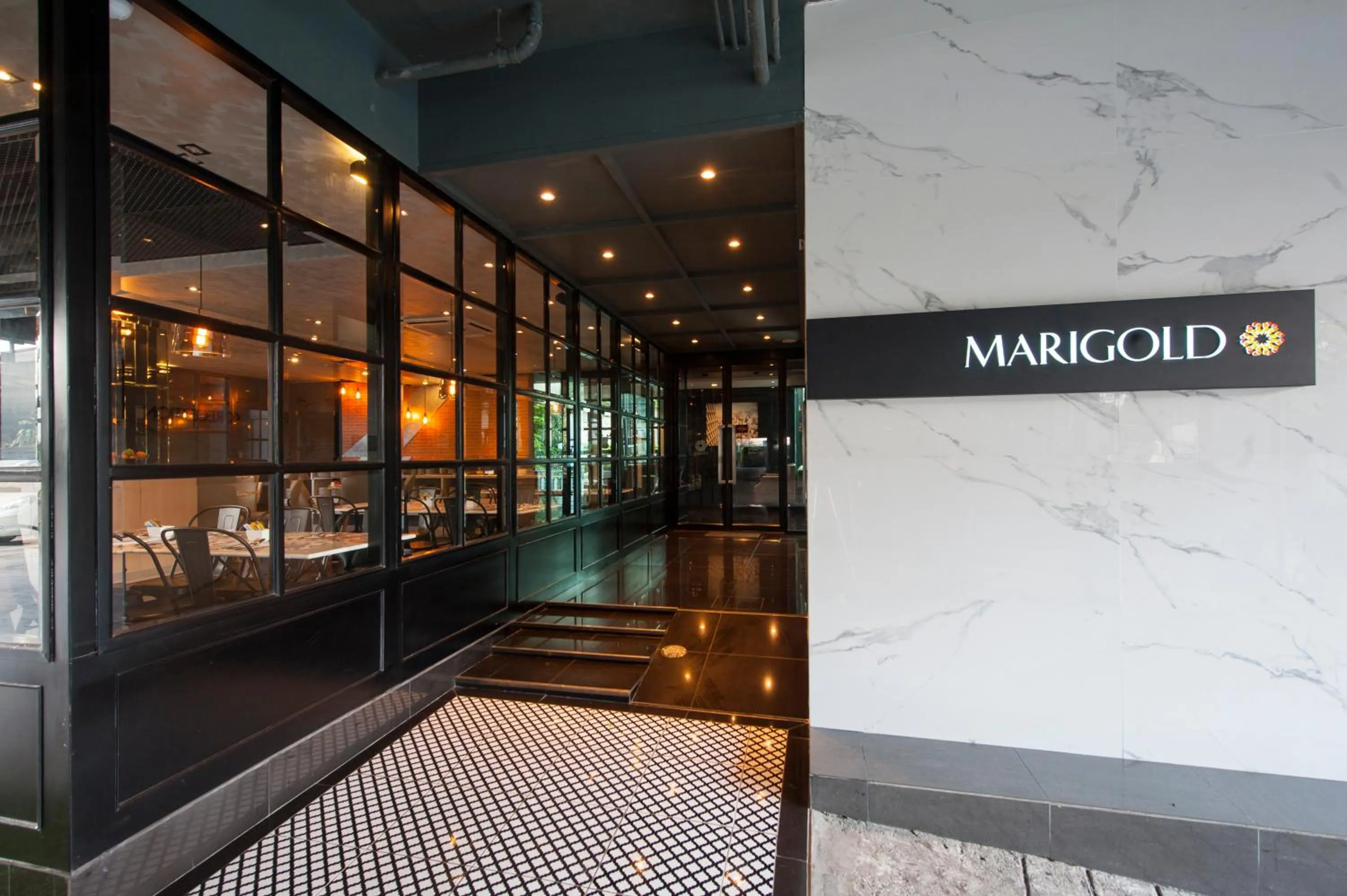 Facade/entrance in Marigold Sukhumvit - Free Shuttle to BTS Bearing Station