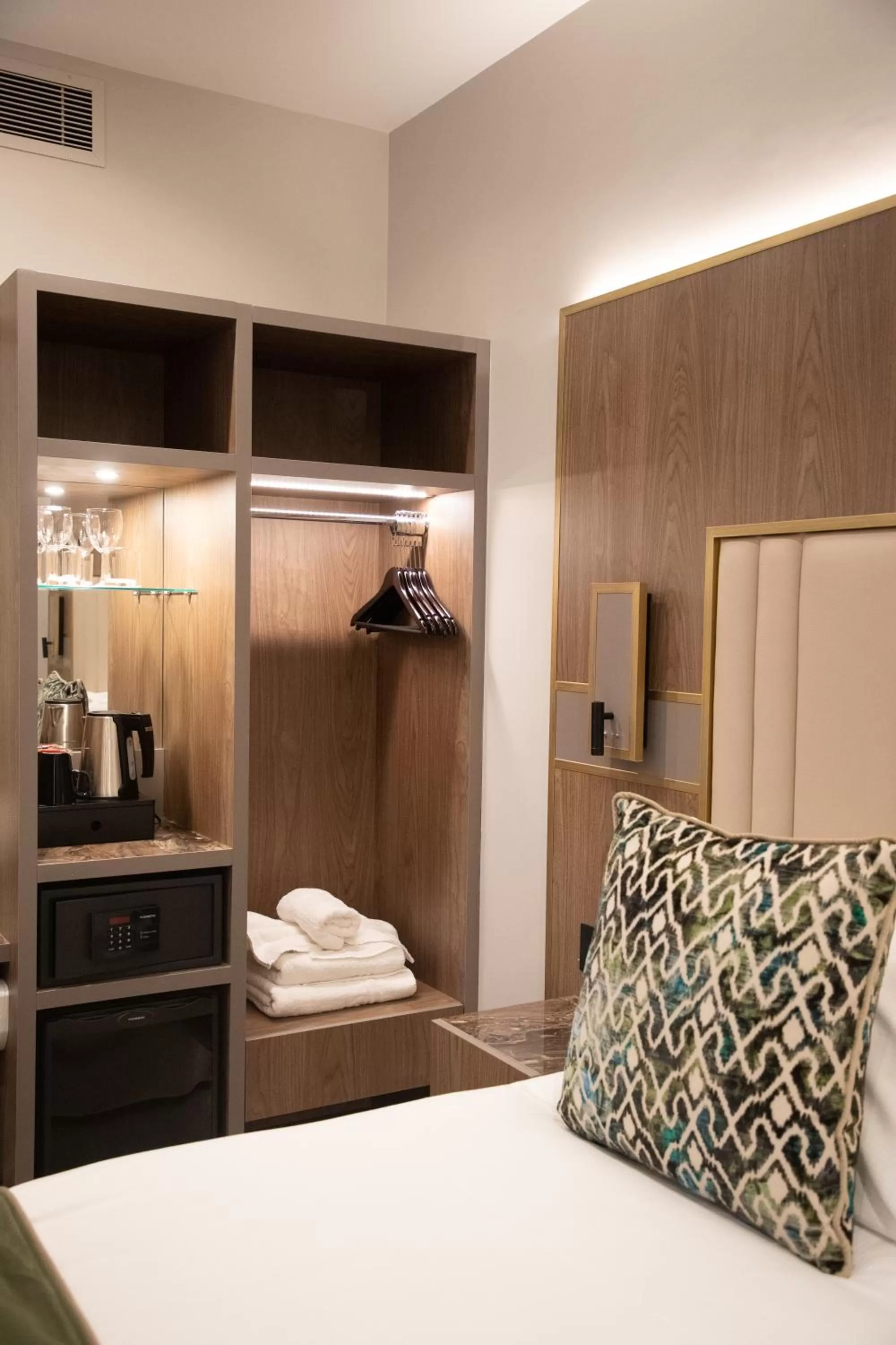 Bed in Merit Kensington Hotel