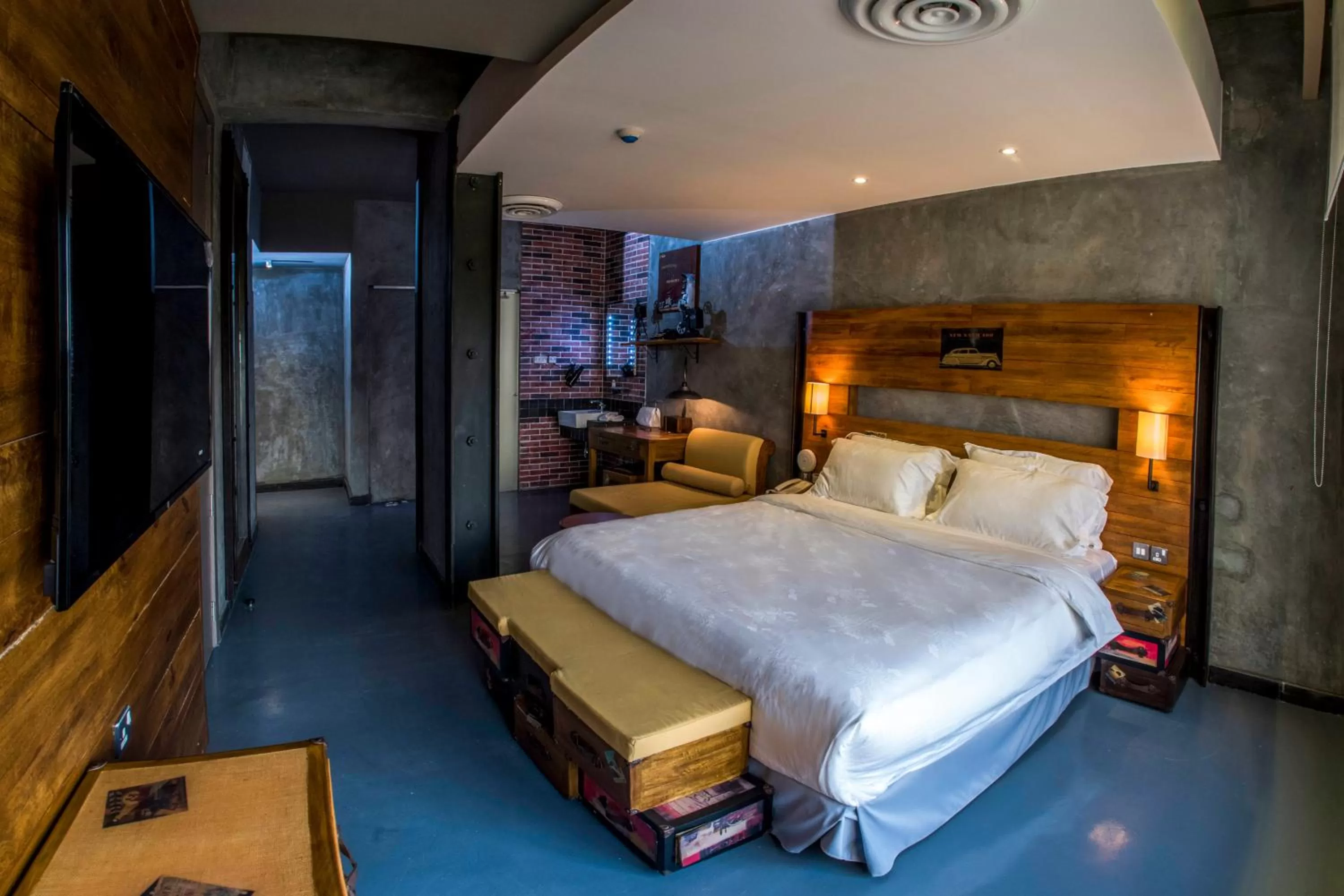 Bed in Flowery Holiday Suites