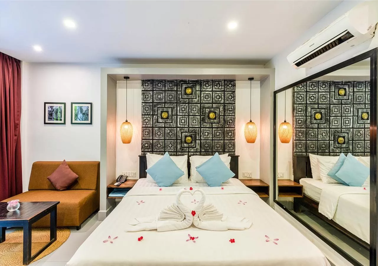 Bed in Ladear Privilege Rooms