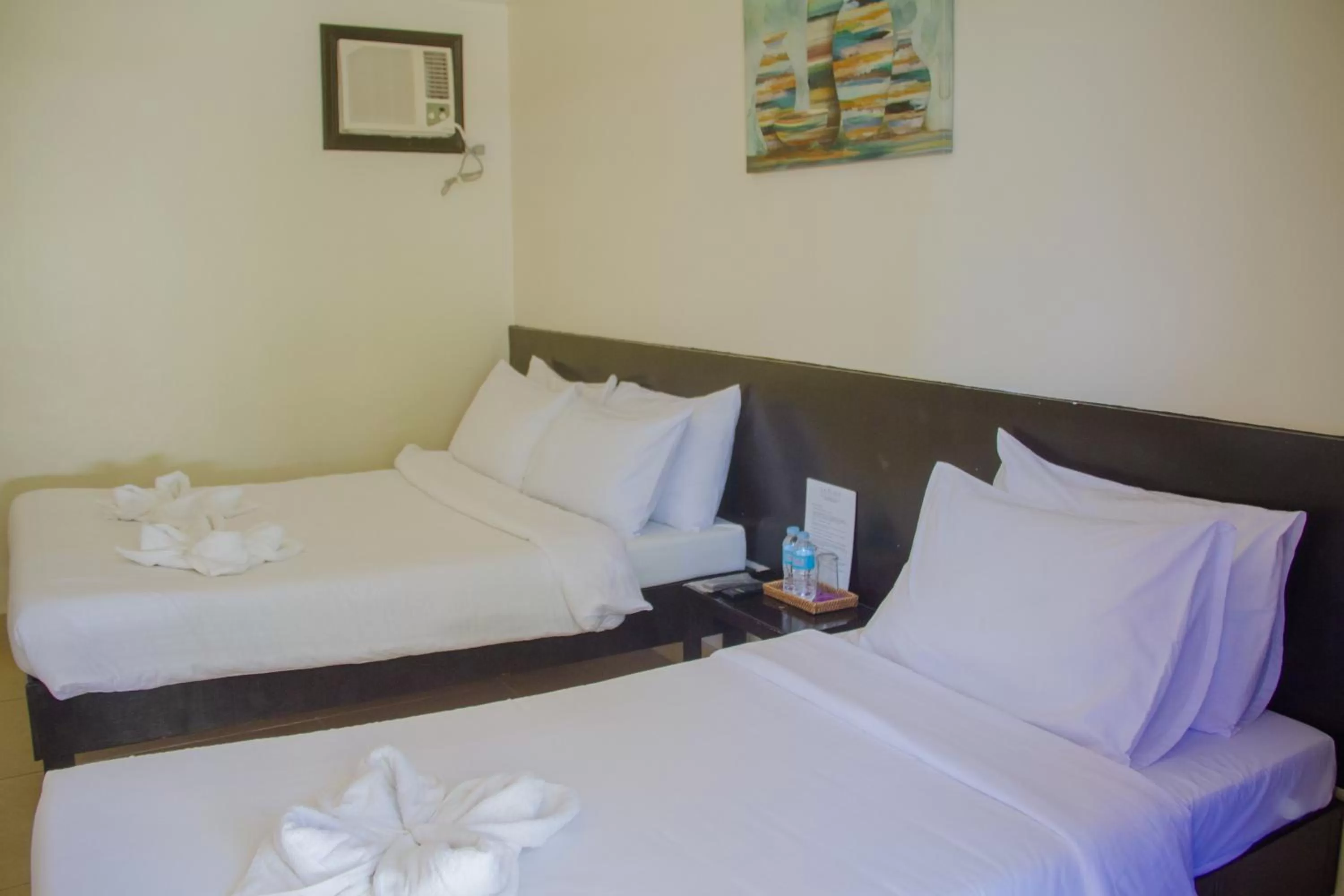 Bed in La Playa Estrella Beach Resort