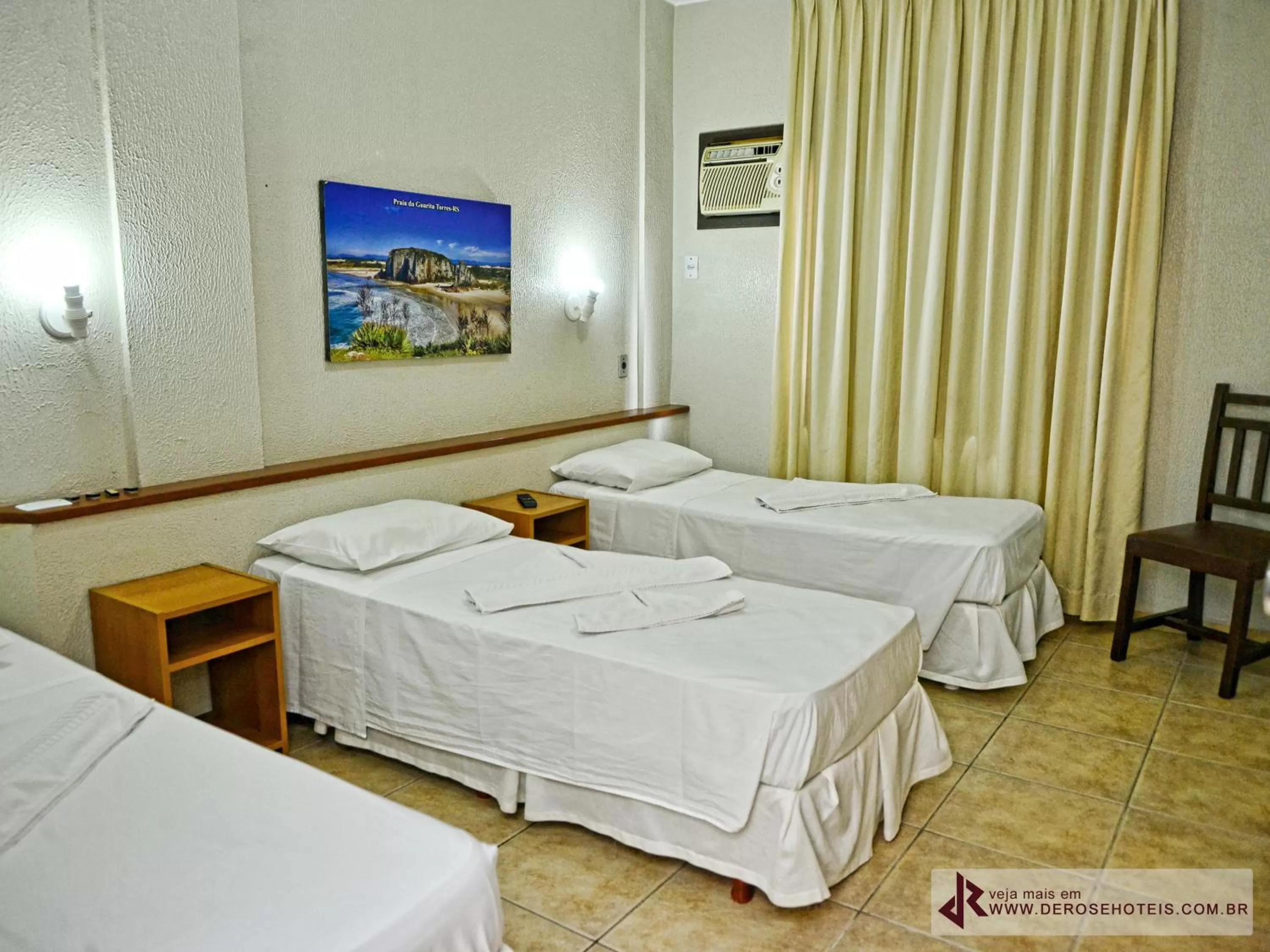 Bed in De Rose Palace Hotel