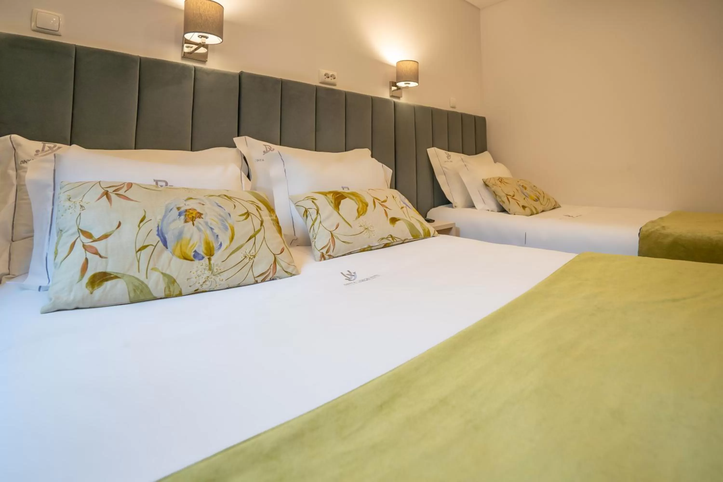 Bed in Dinya Lisbon Hotel