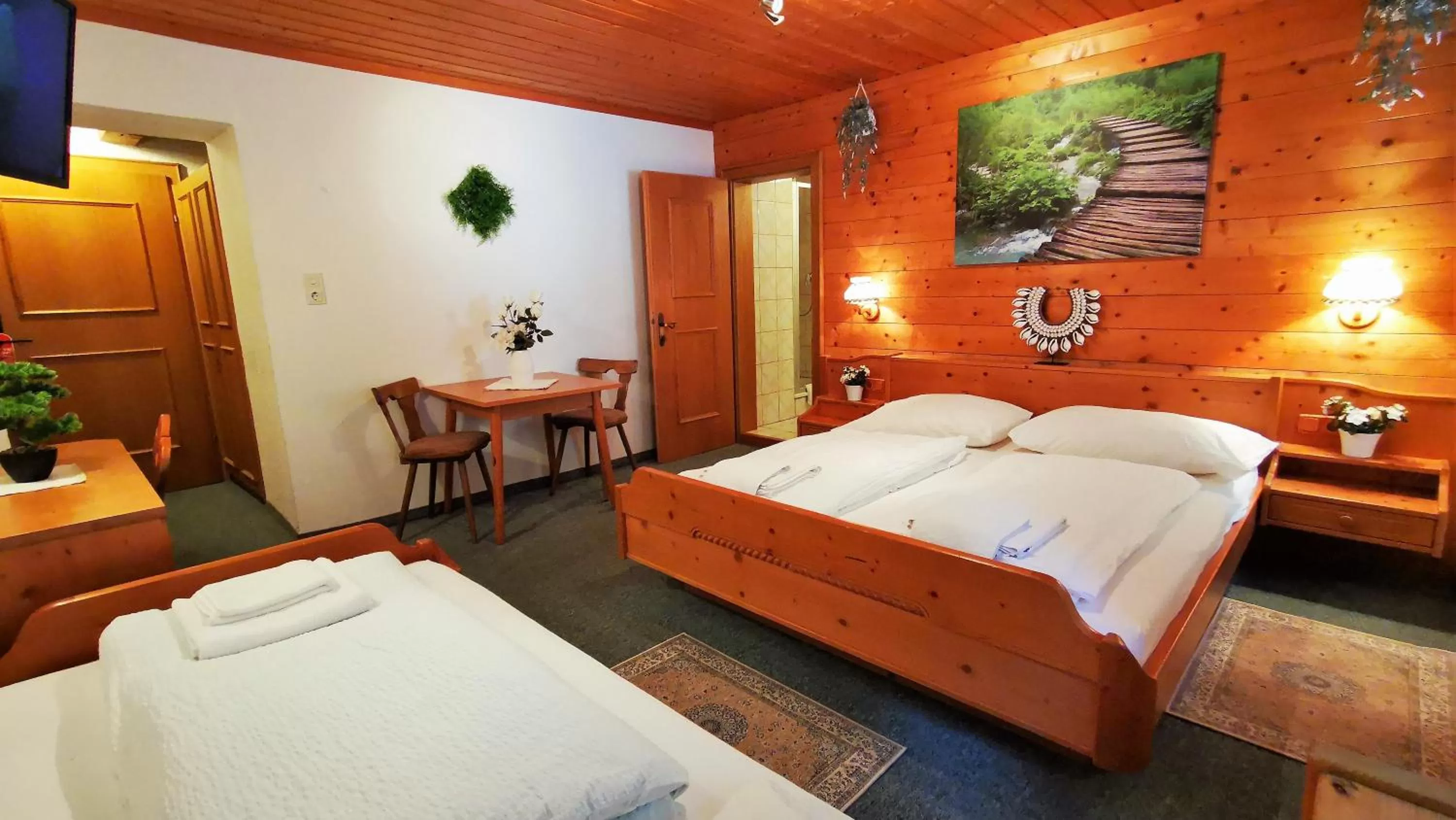 Photo of the whole room, Bed in Gasthof Geronimo