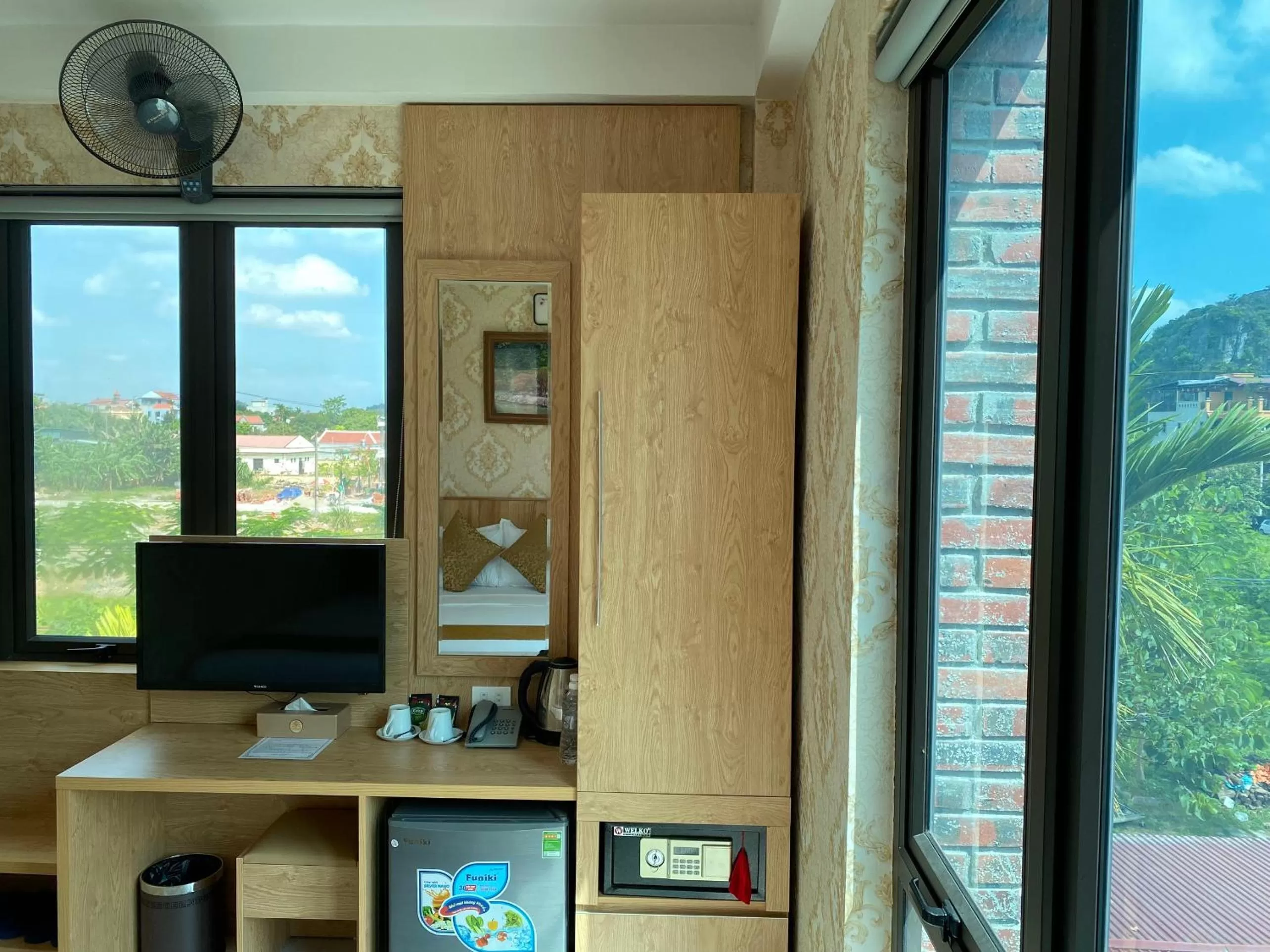 TV and multimedia, TV/Entertainment Center in Cozynibi Hotel