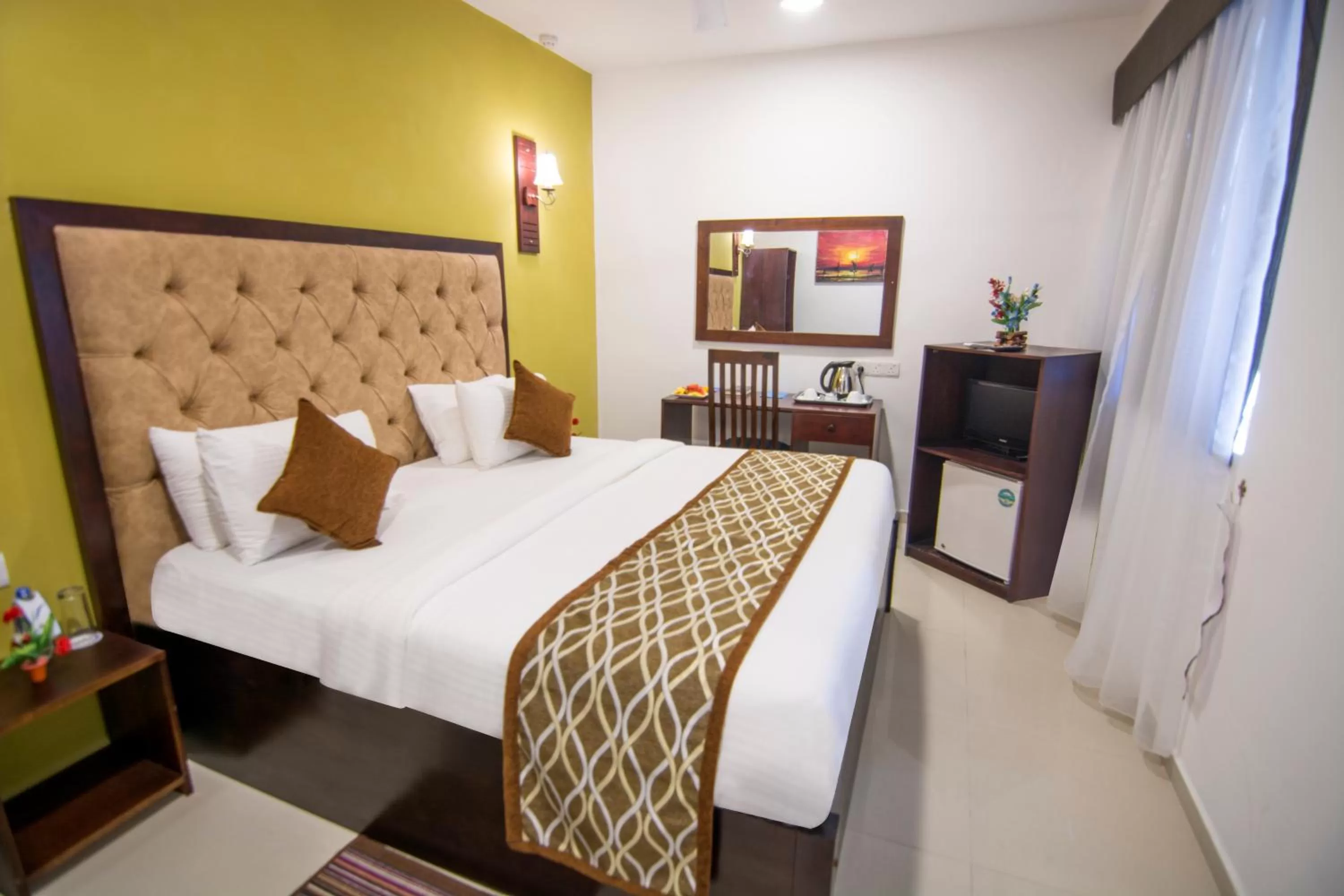 Bed in Mount Breeze Hotel