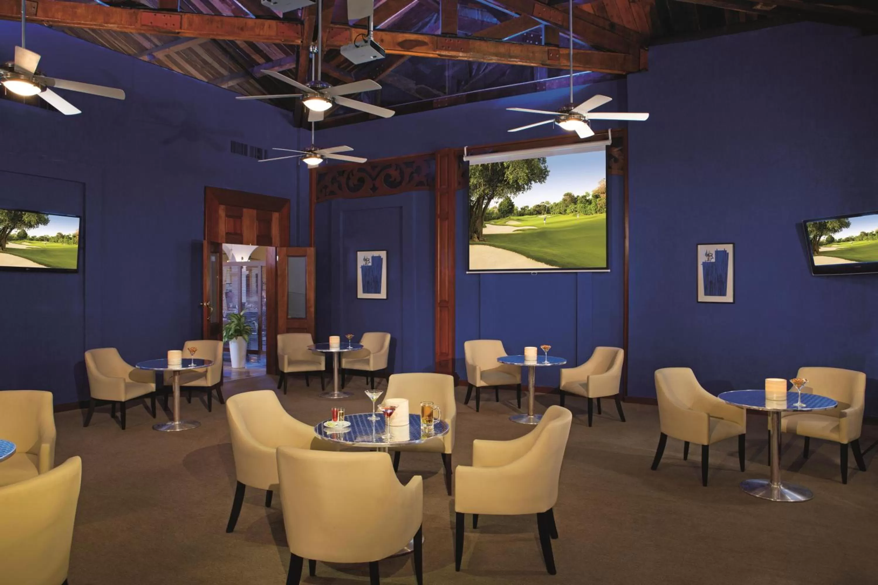 Communal lounge/ TV room in Dreams Tulum Resort & Spa