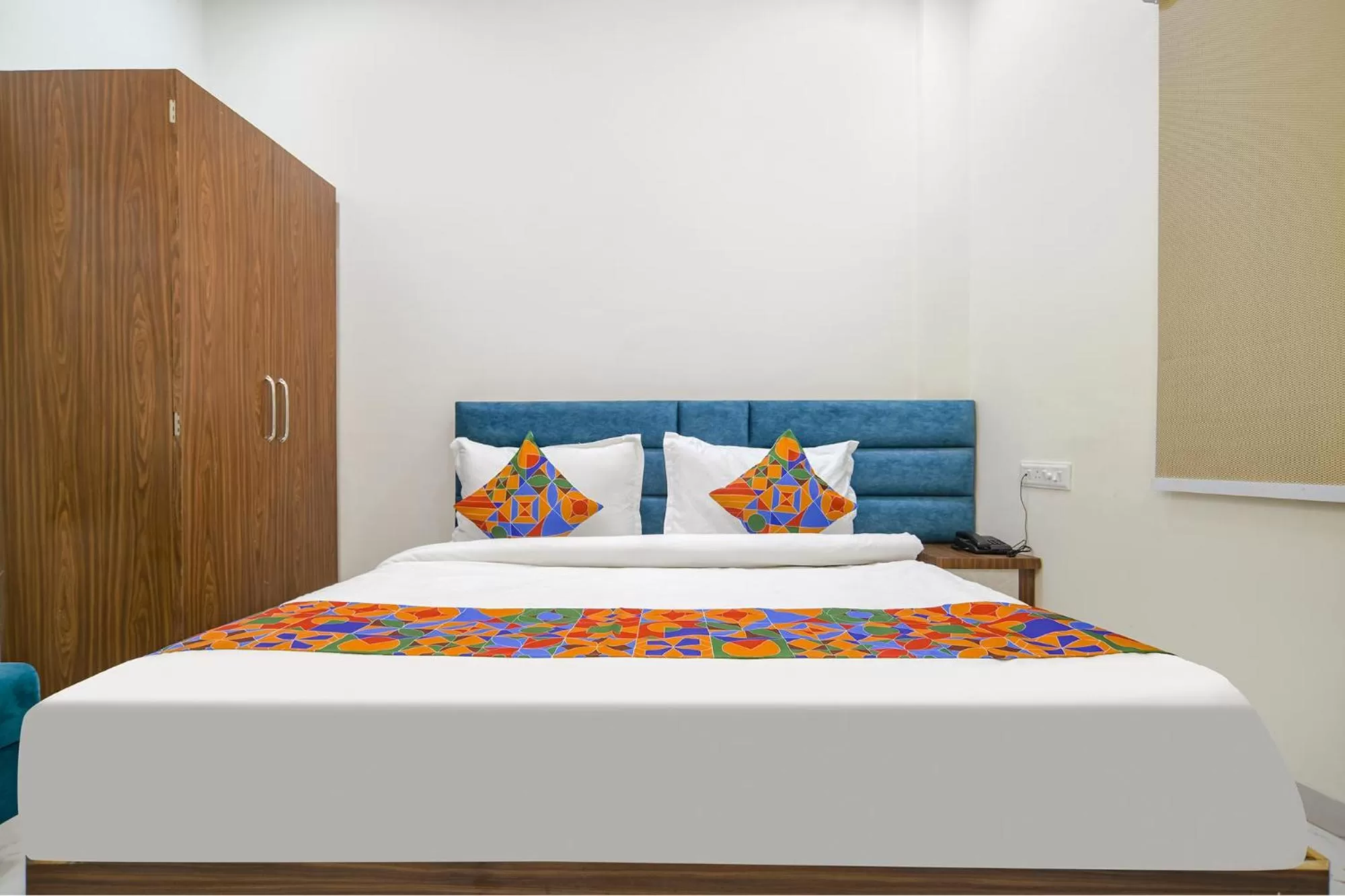 Bed in FabHotel Ramya