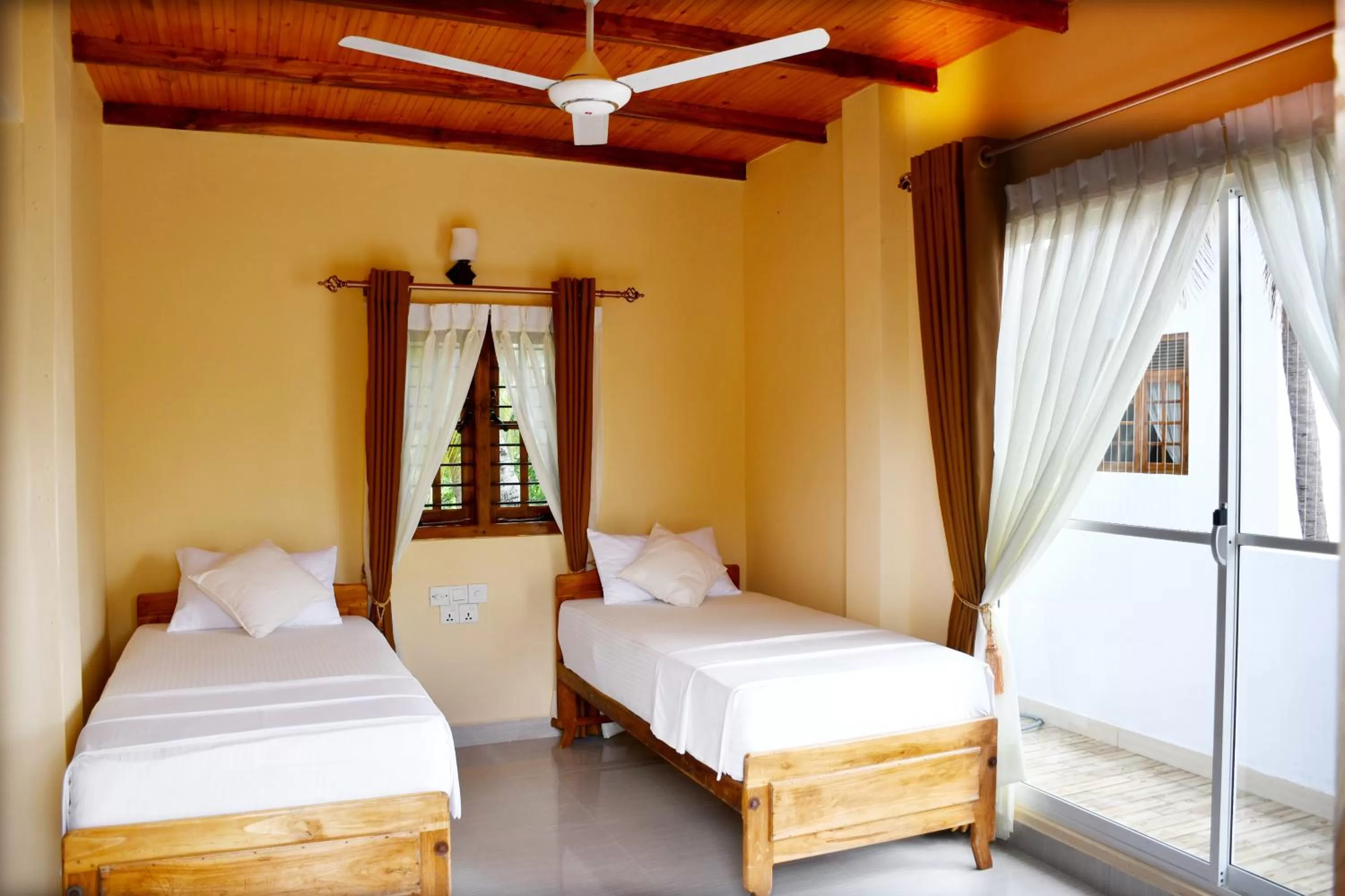 Bed in Bluewater Beach Resort