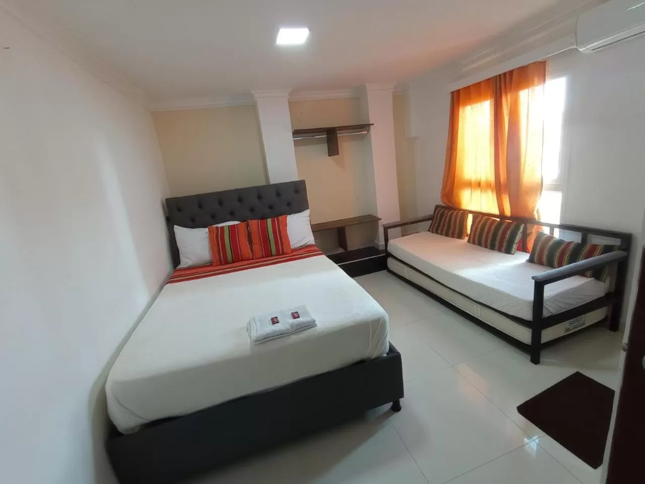 Bed in ANAJIRAWAA HOTEL