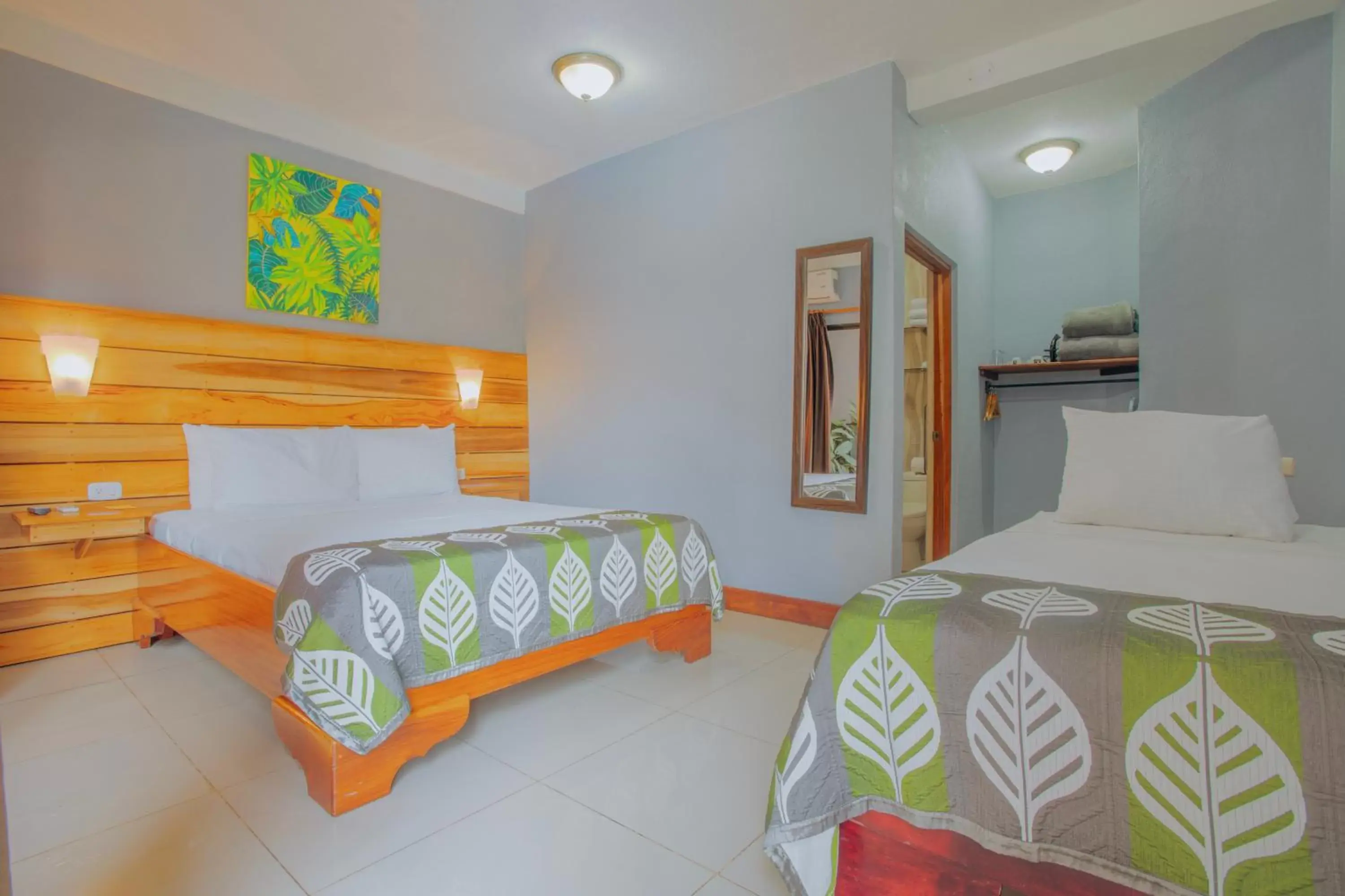 Downtown Triple (1 Full bed + 1 Single Bed) in La Fortuna Downtown Hotel Boutique Downtown Triple (1 Full bed + 1 Single Bed) in La Fortuna Downtown Hotel Boutique