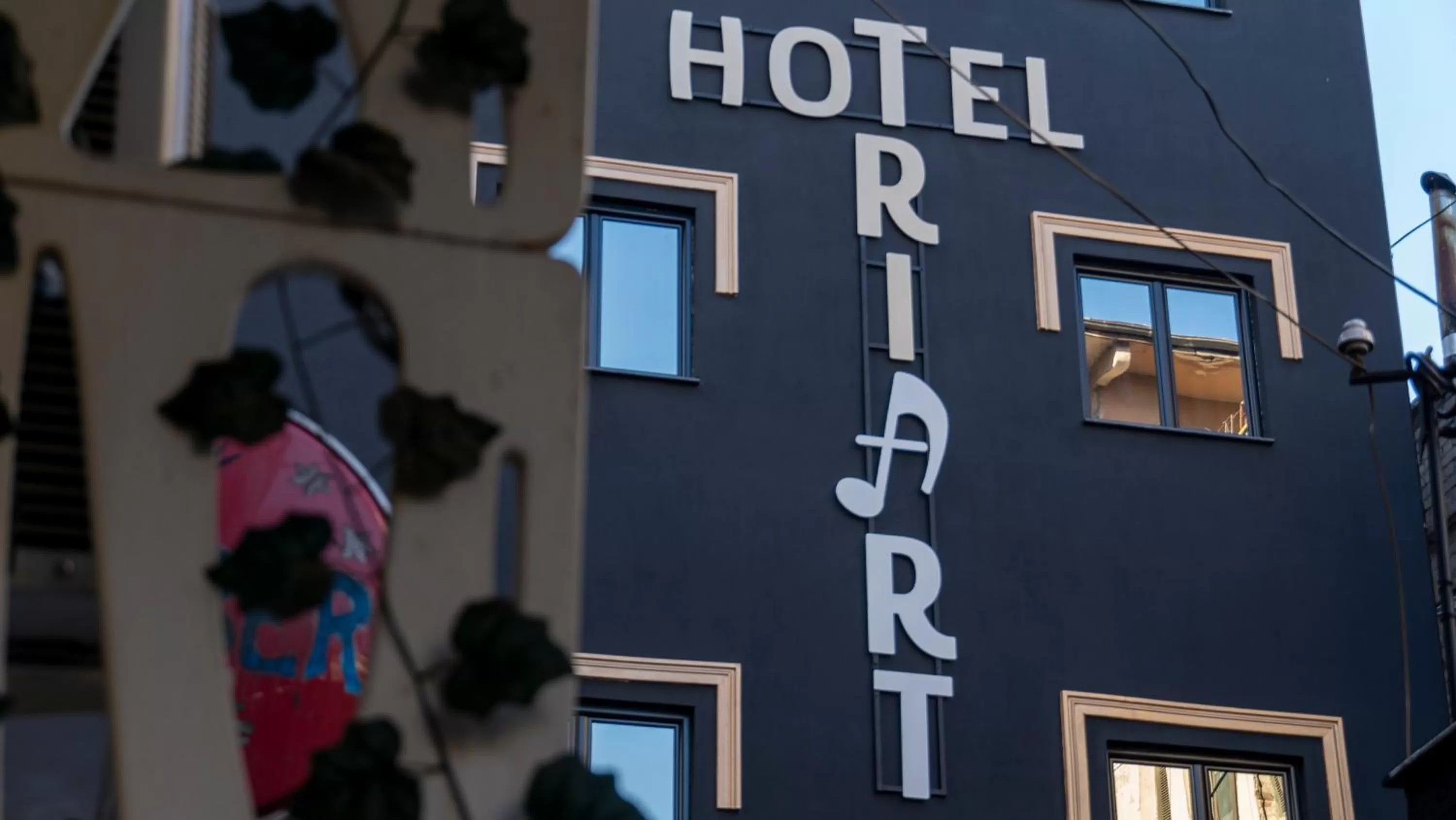 Property logo or sign in Hotel Triart