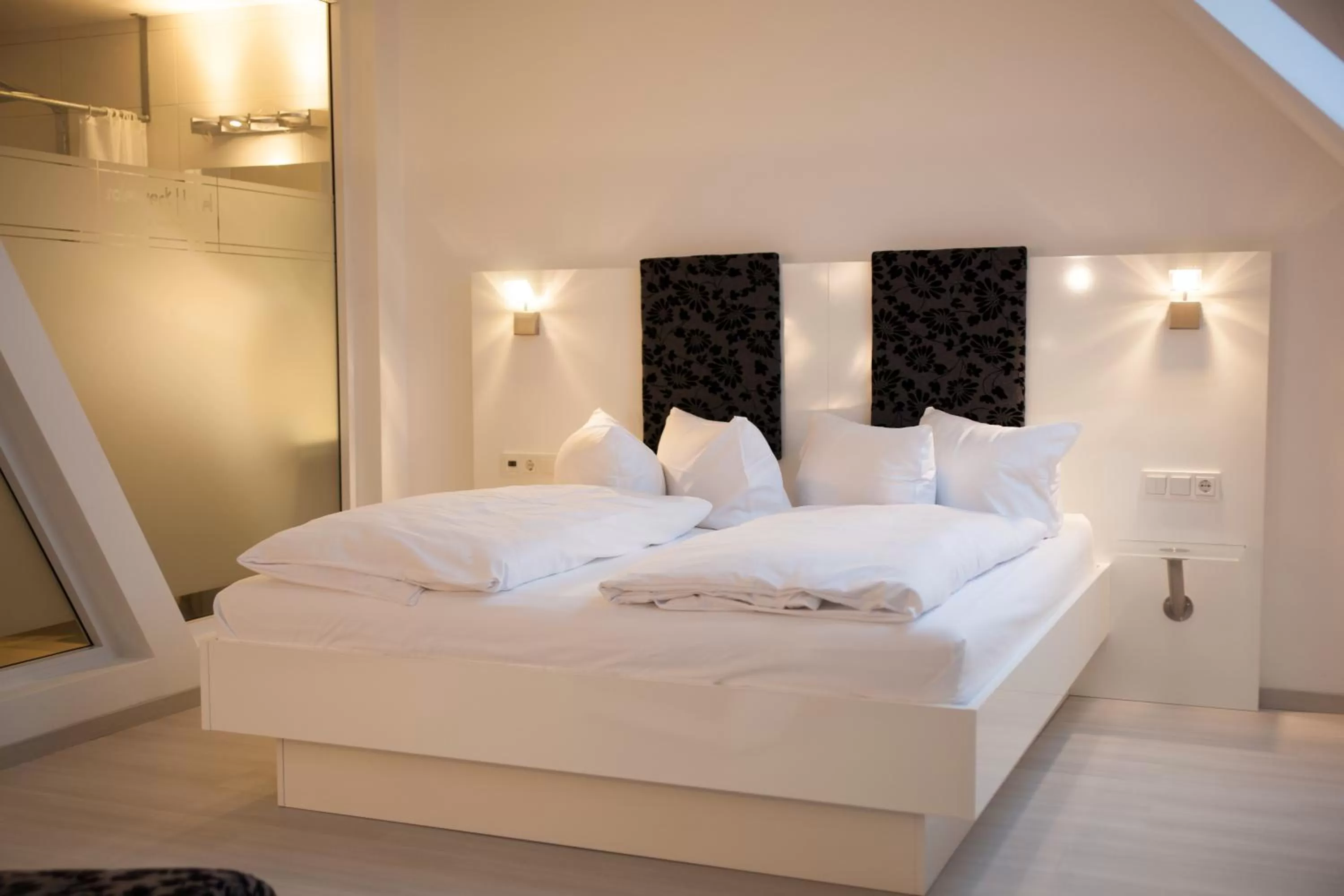 Bed in SOLEWERK Hotel