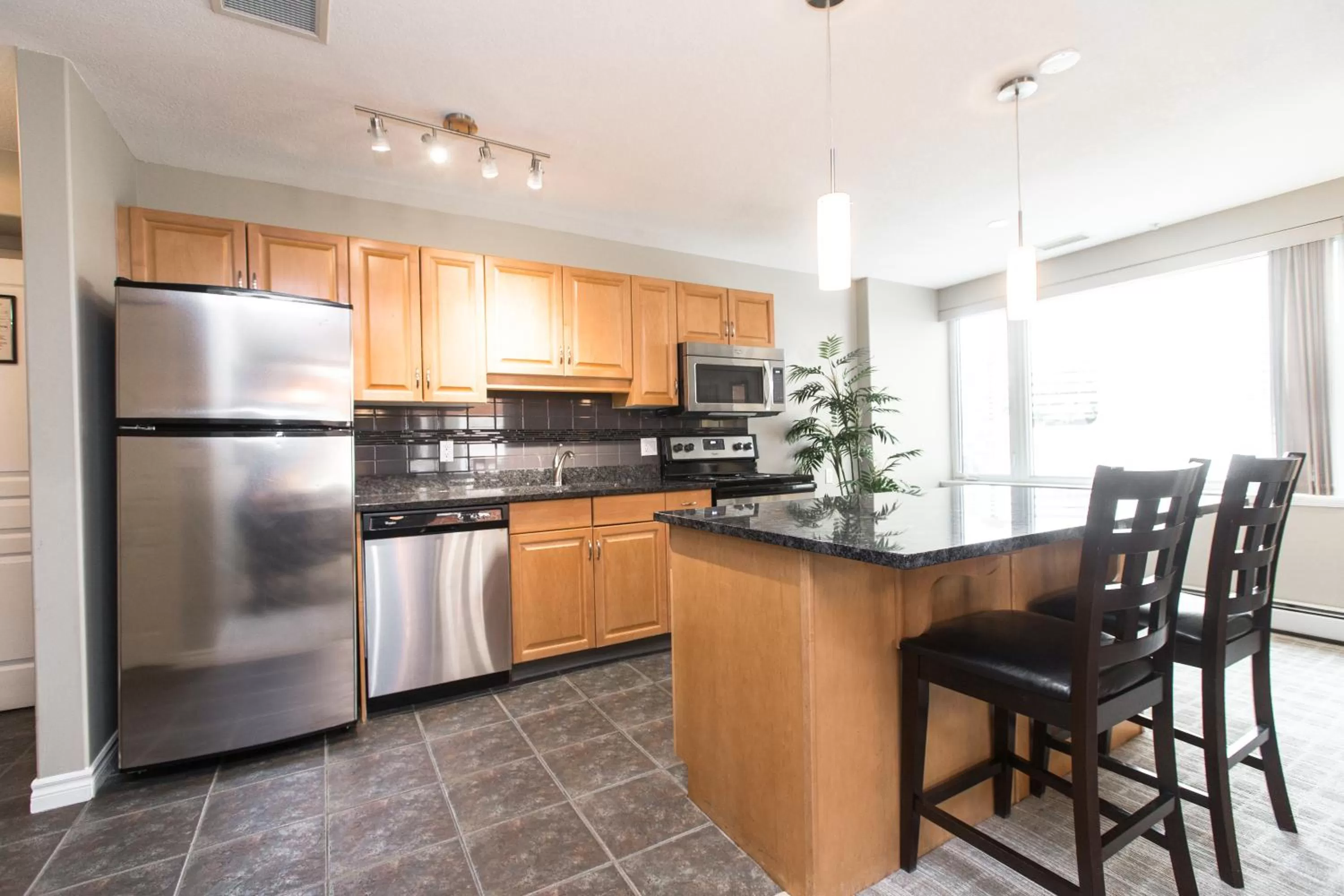 Kitchen or kitchenette in Canterra Suites Hotel