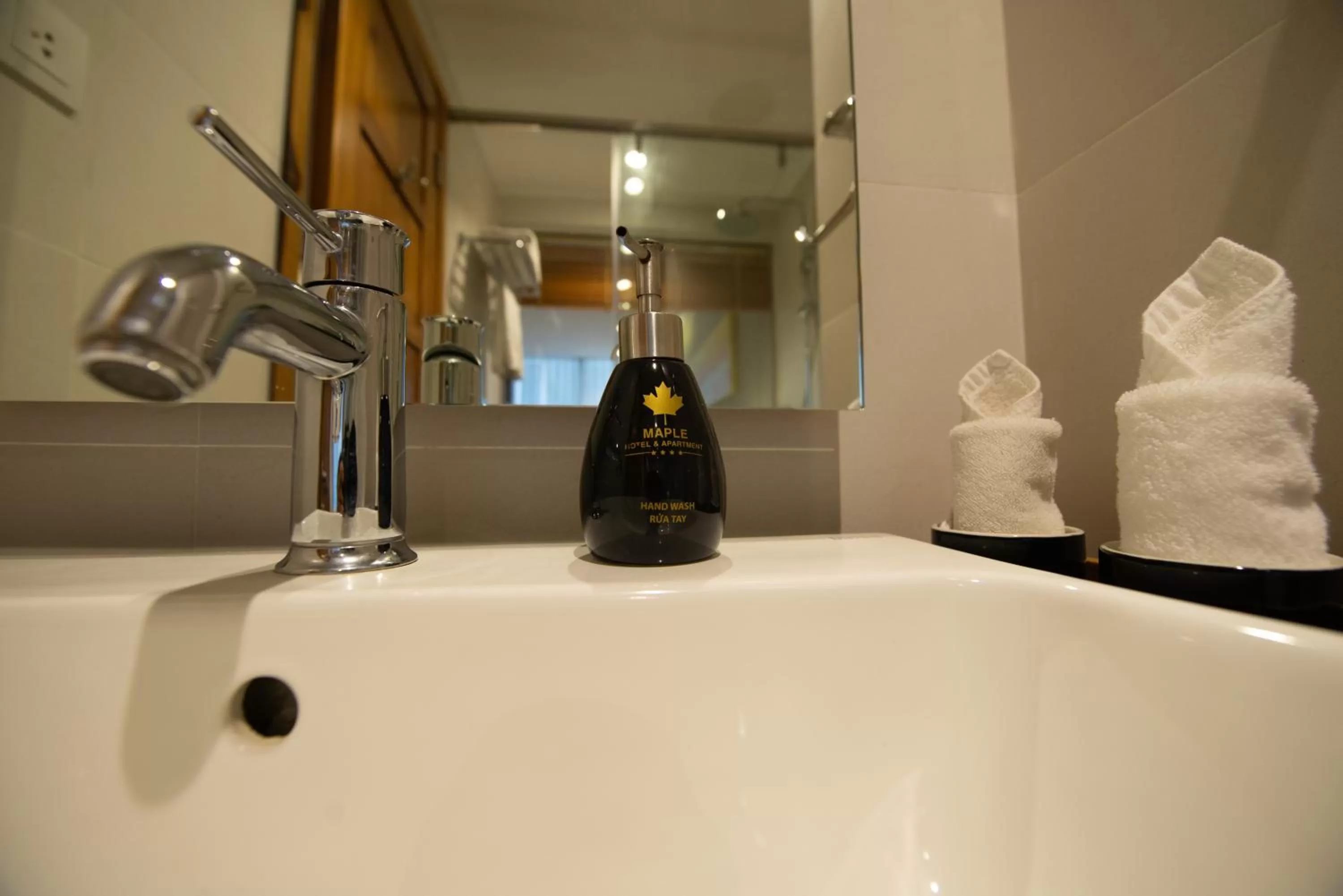 Shower in Maple Hotel & Apartment