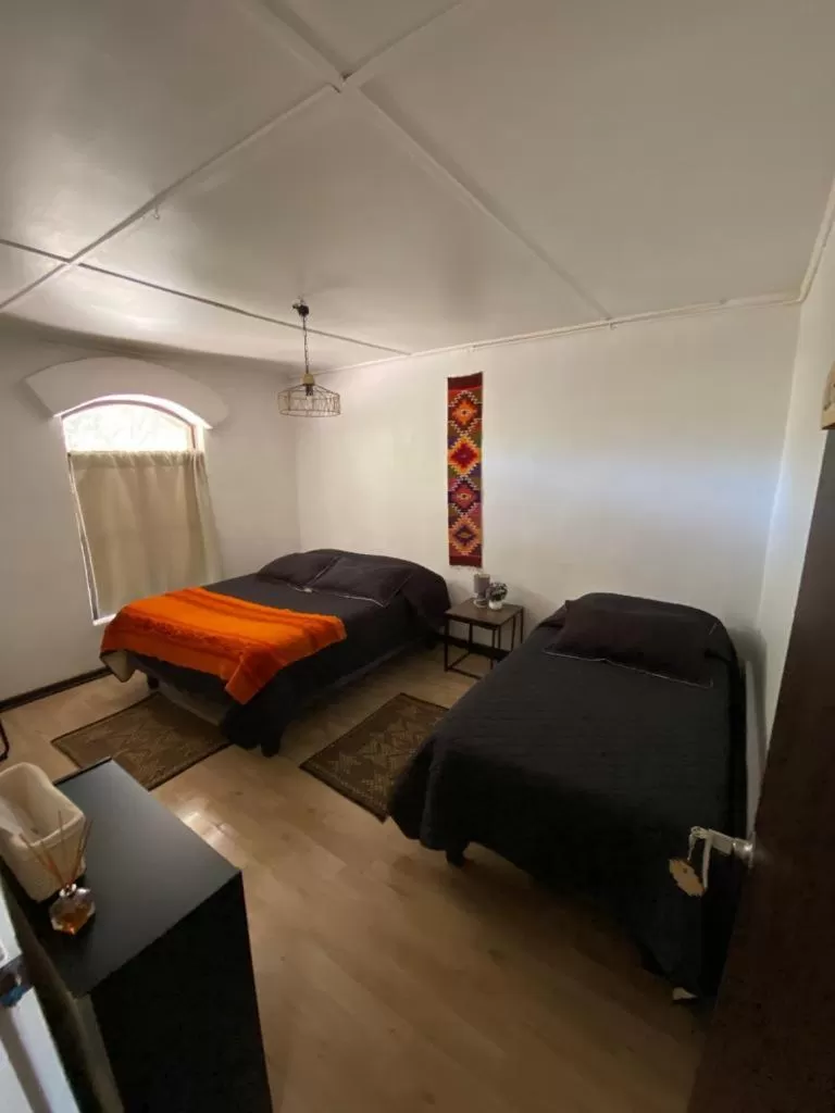 Bed in CaminAndes Hostal