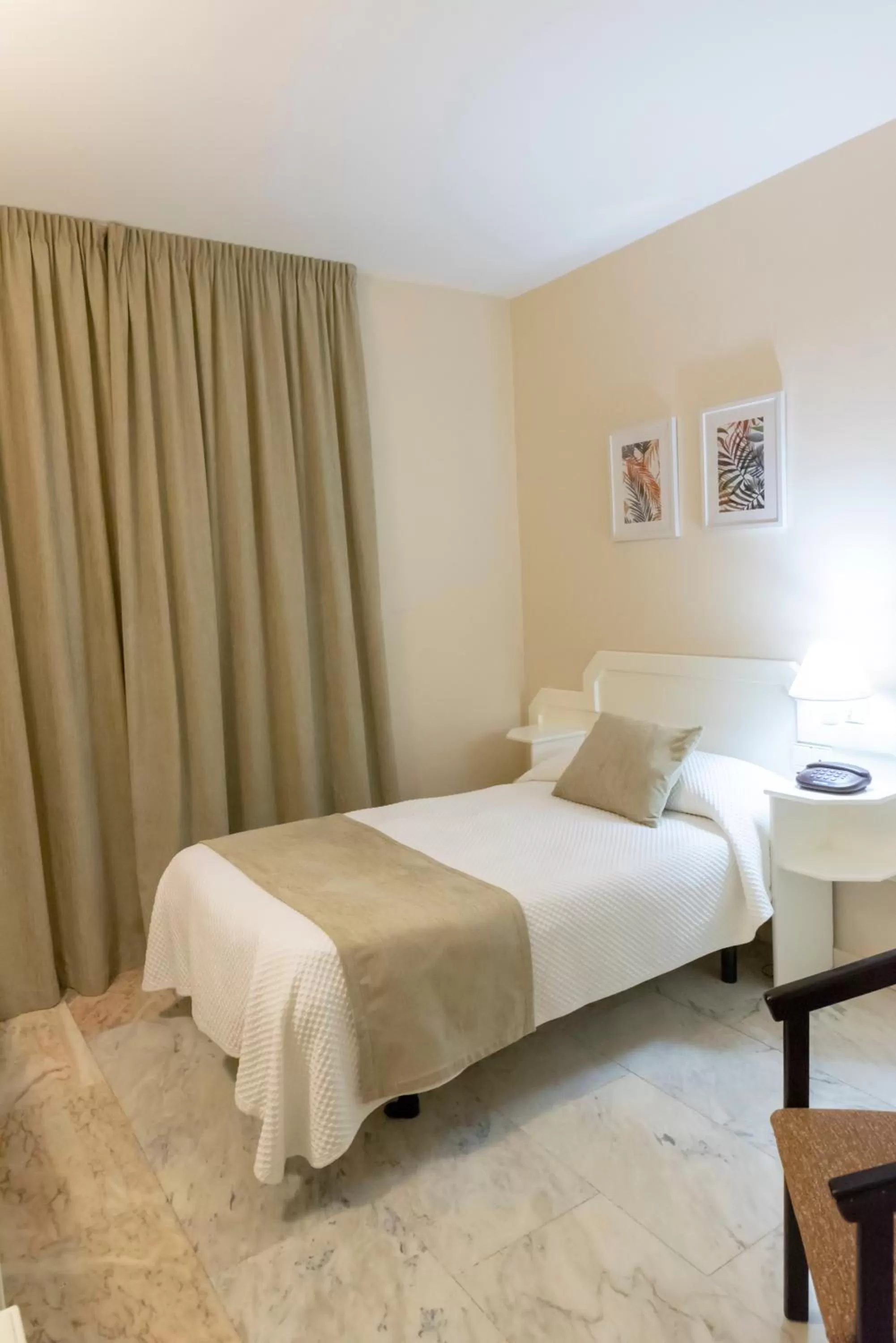 Bed in Hotel Ramomar