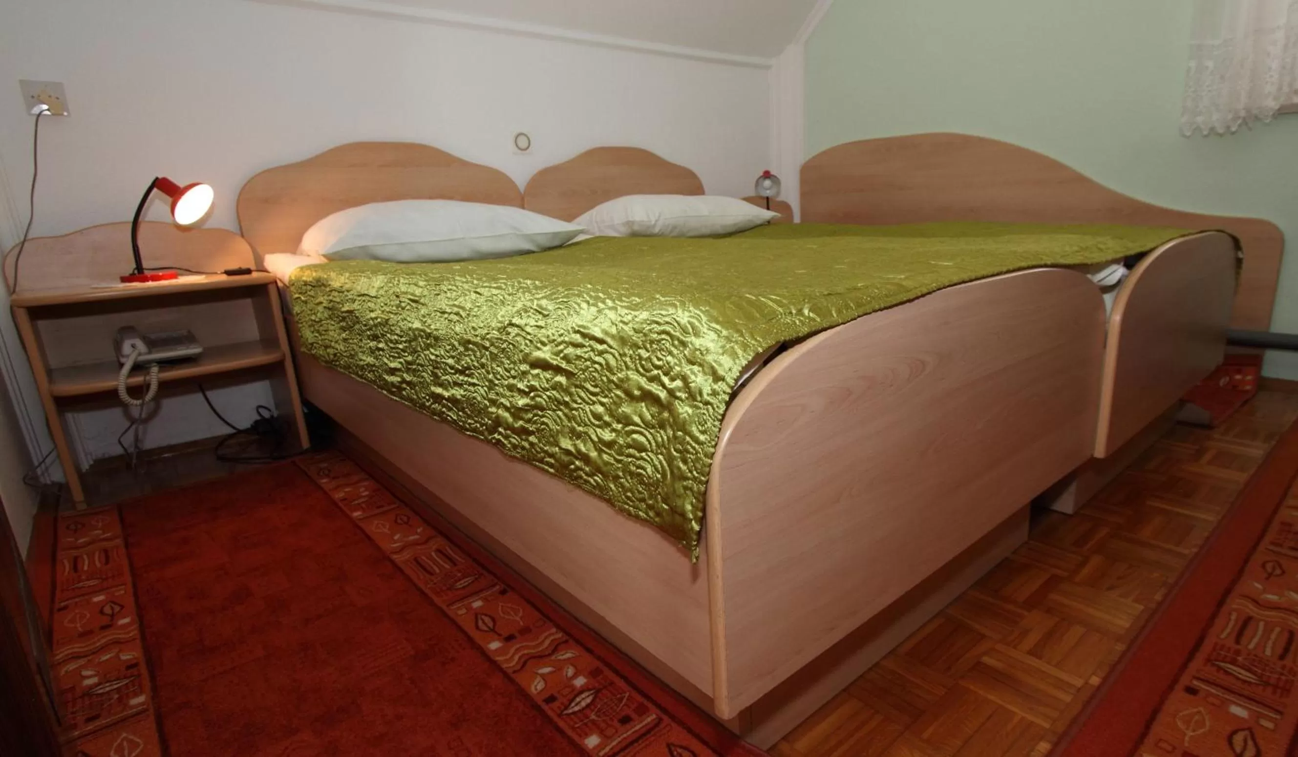 Bed in Rooms & Apartments Jana